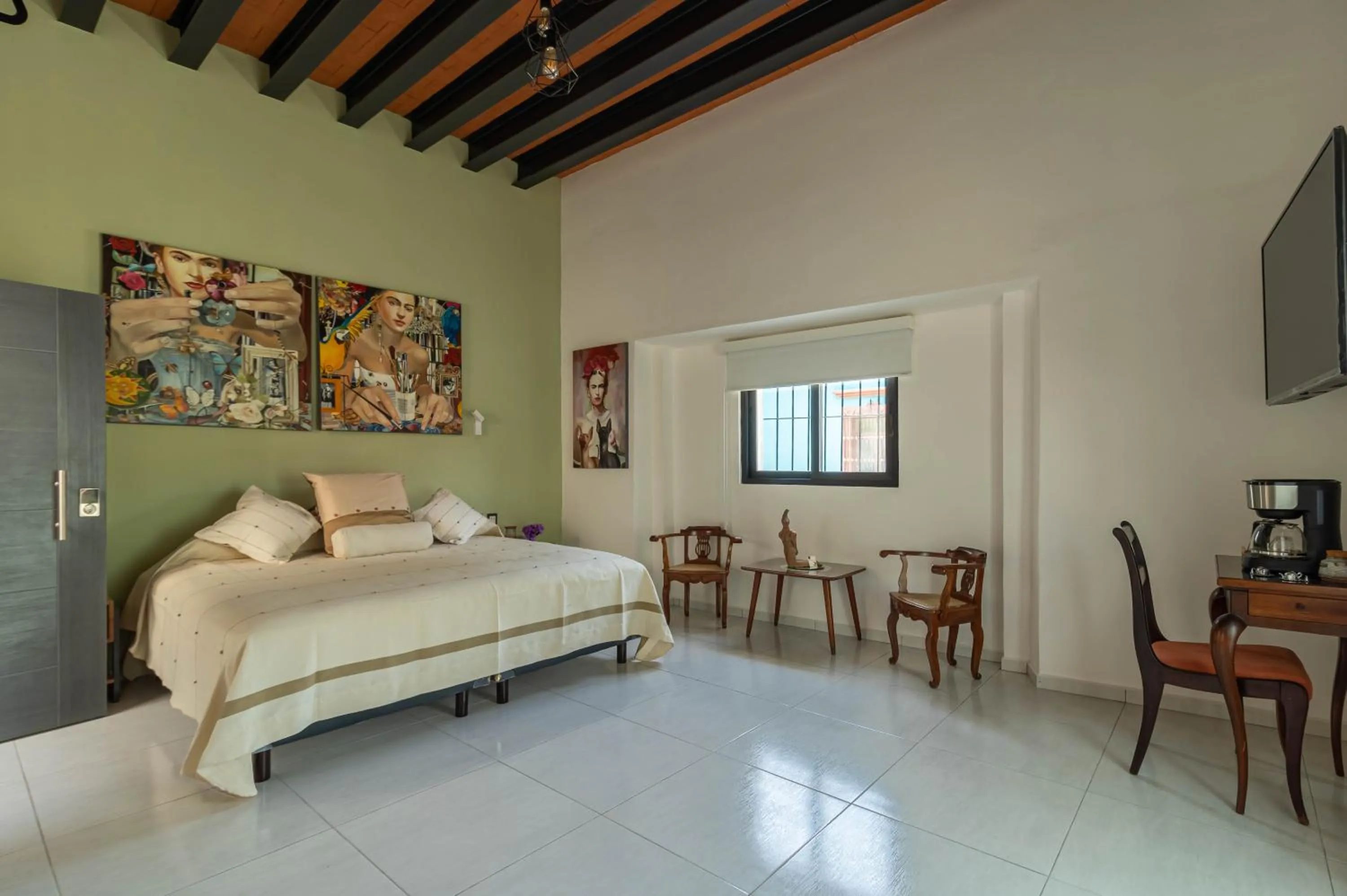 Photo of the whole room, Bed in LARIMAR Gallery y Hotel Boutique