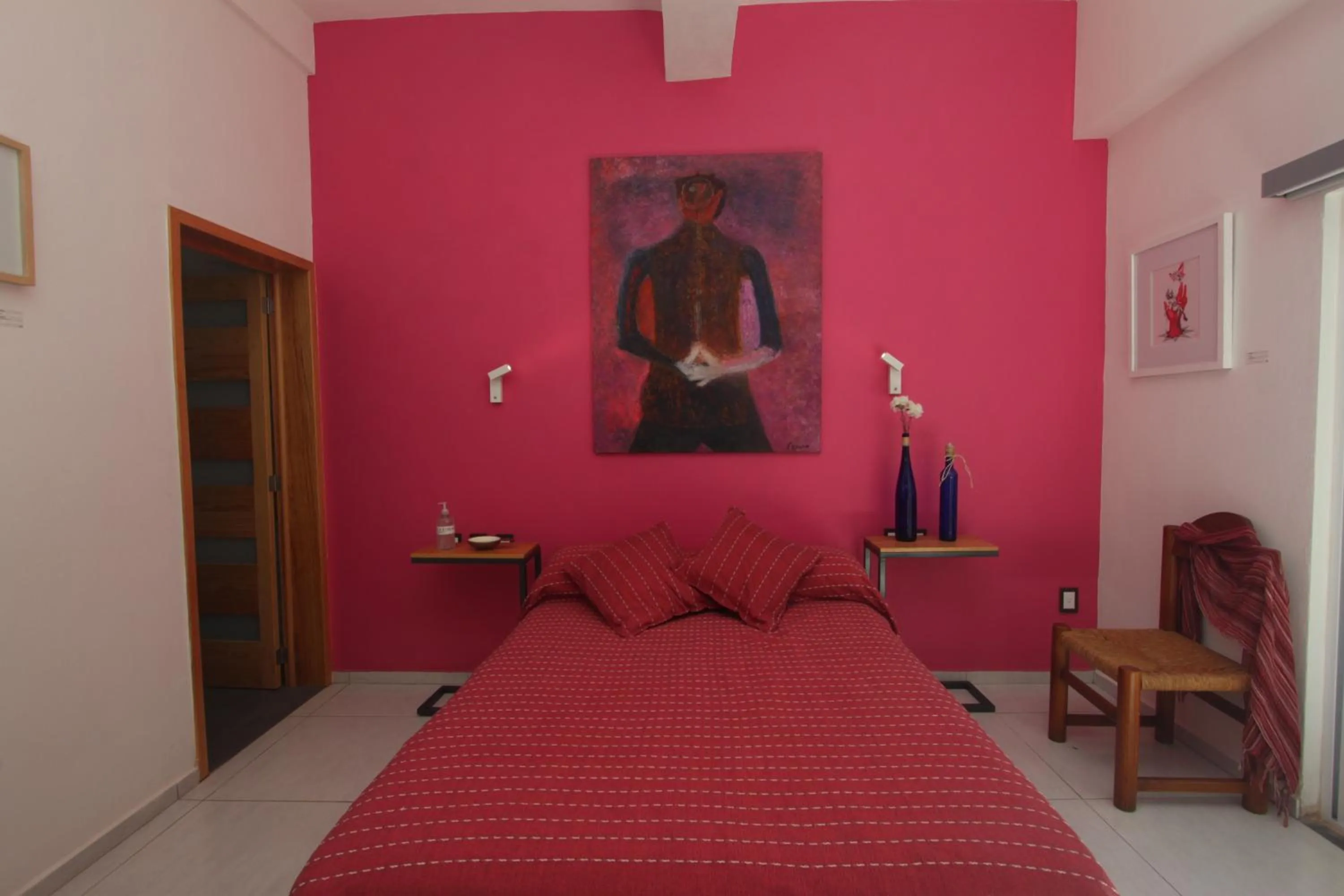 Bed in LARIMAR Gallery y Hotel Boutique