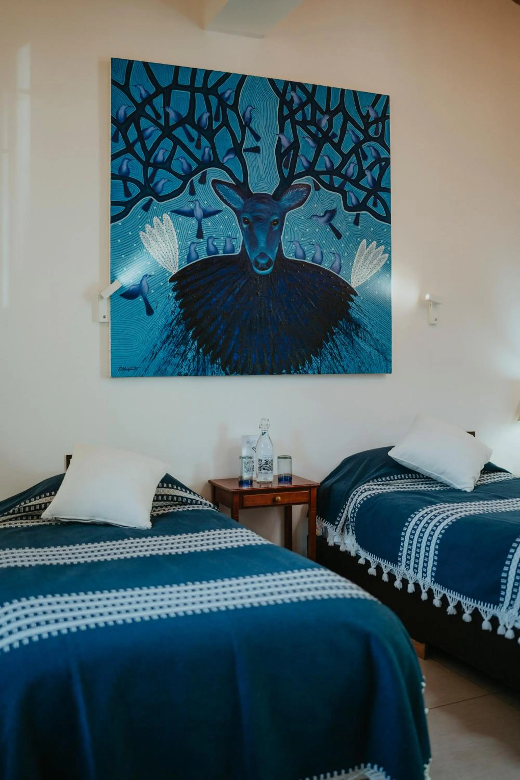 Bed in LARIMAR Gallery y Hotel Boutique