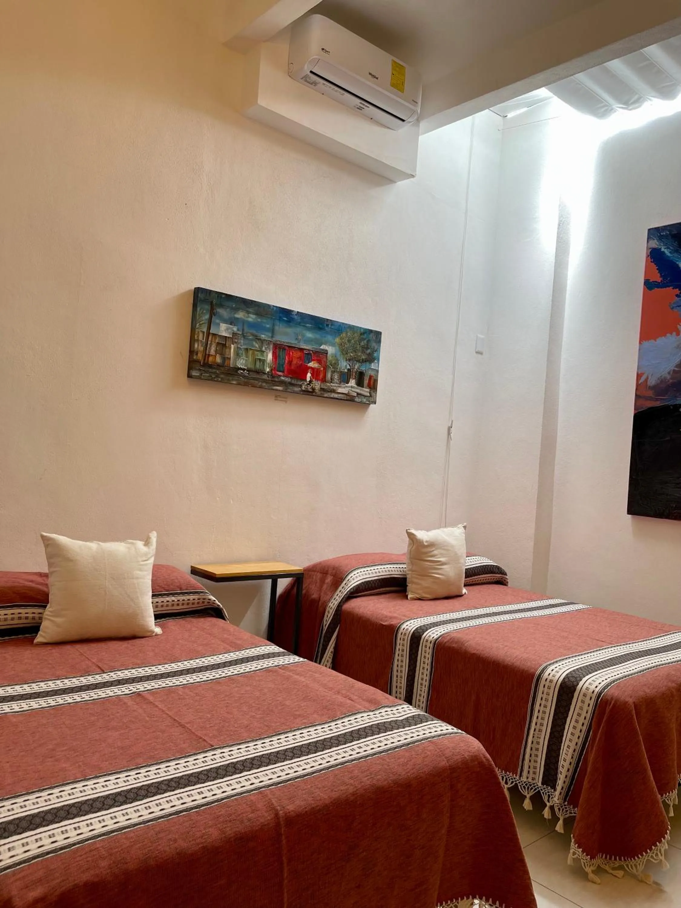 Bed in LARIMAR Gallery y Hotel Boutique