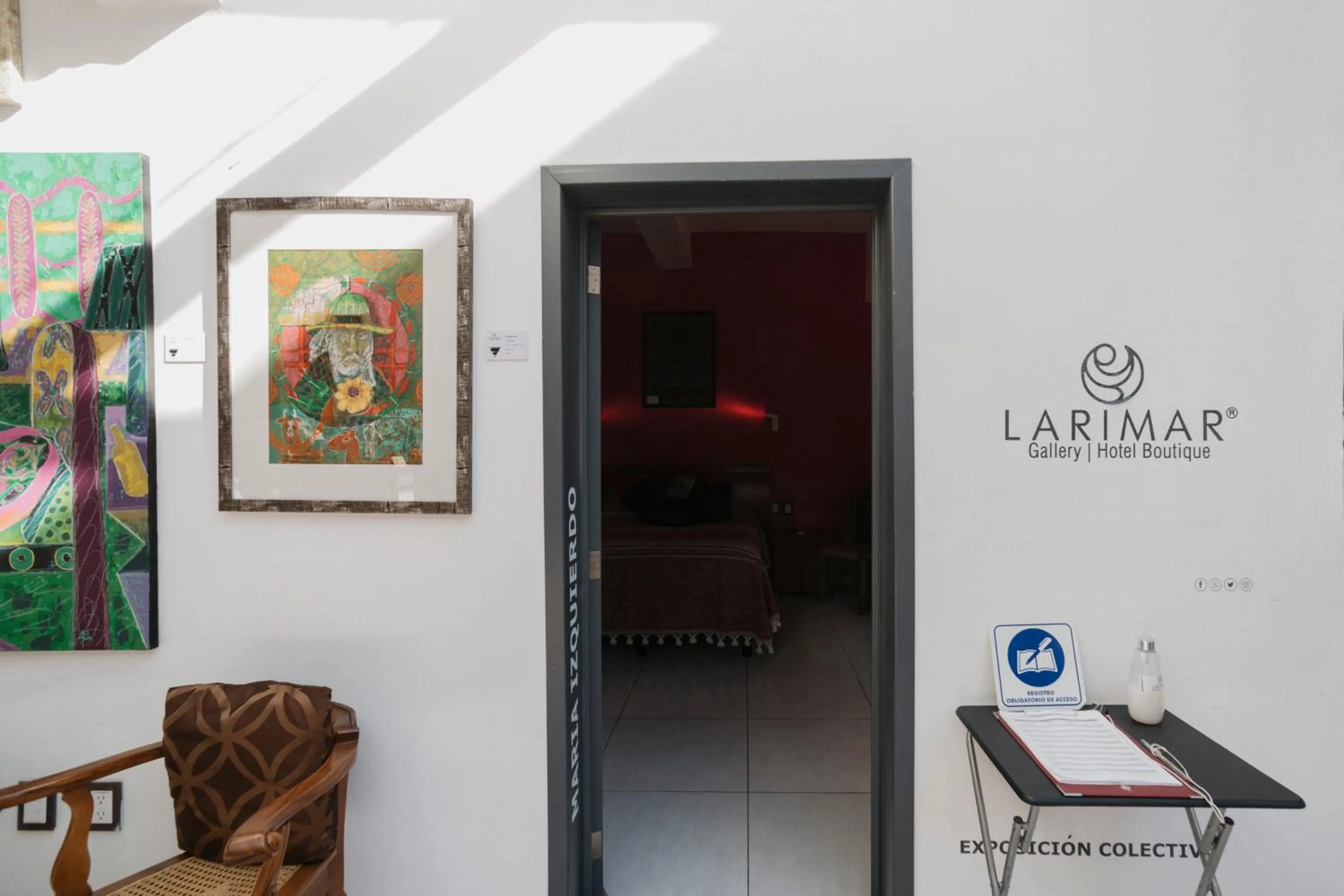 Property logo or sign in LARIMAR Gallery y Hotel Boutique