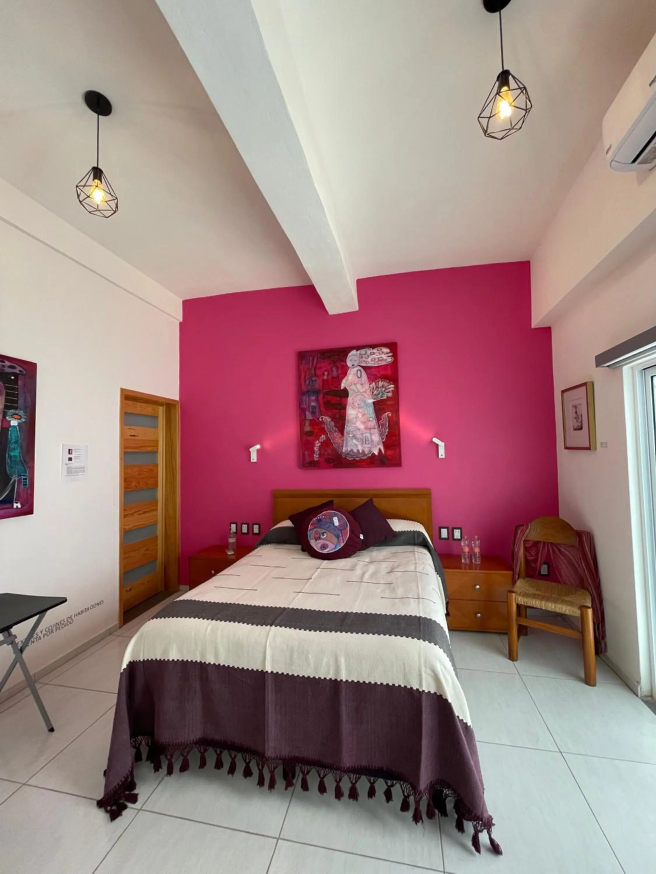 Bed in LARIMAR Gallery y Hotel Boutique