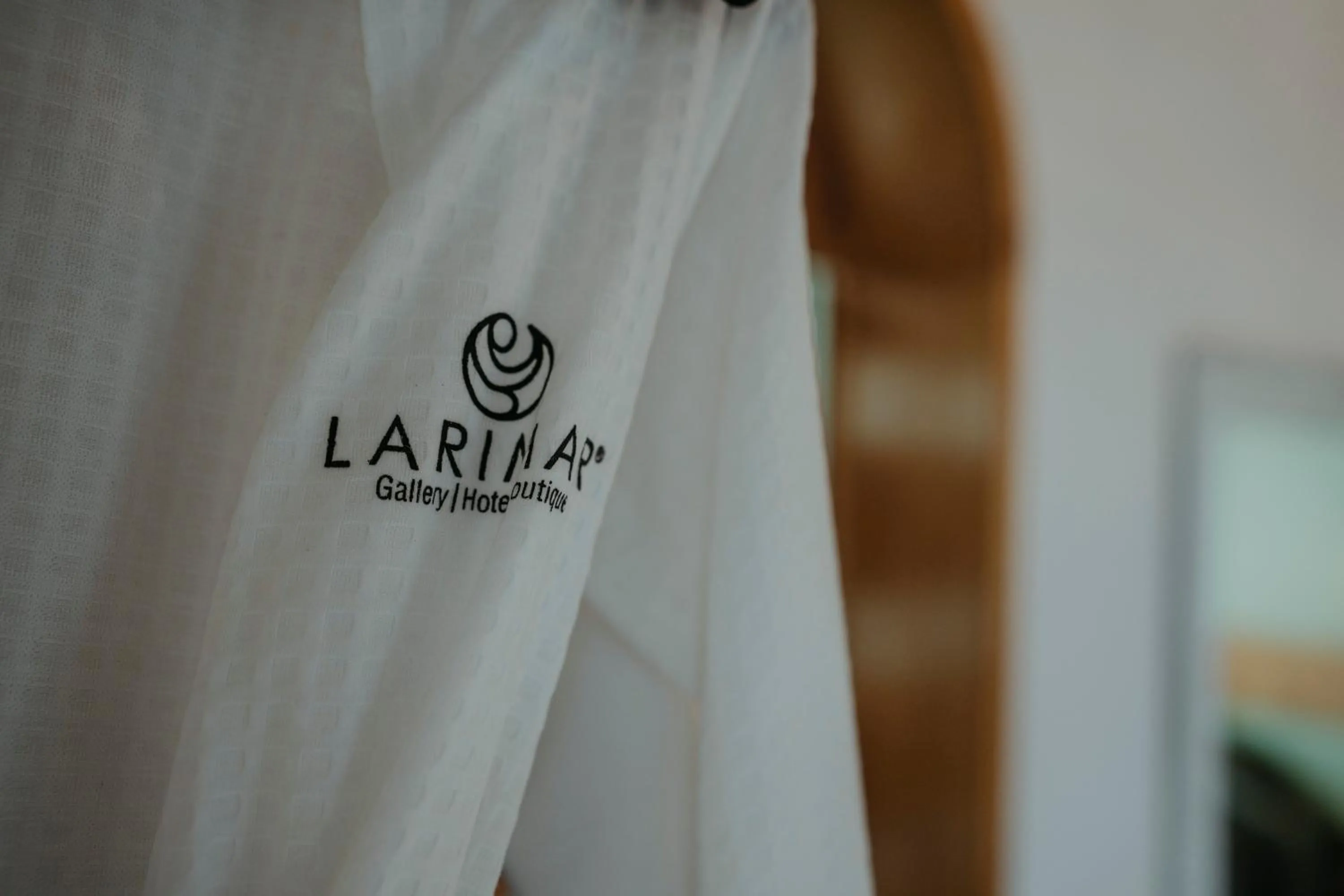 Logo/Certificate/Sign in LARIMAR Gallery y Hotel Boutique