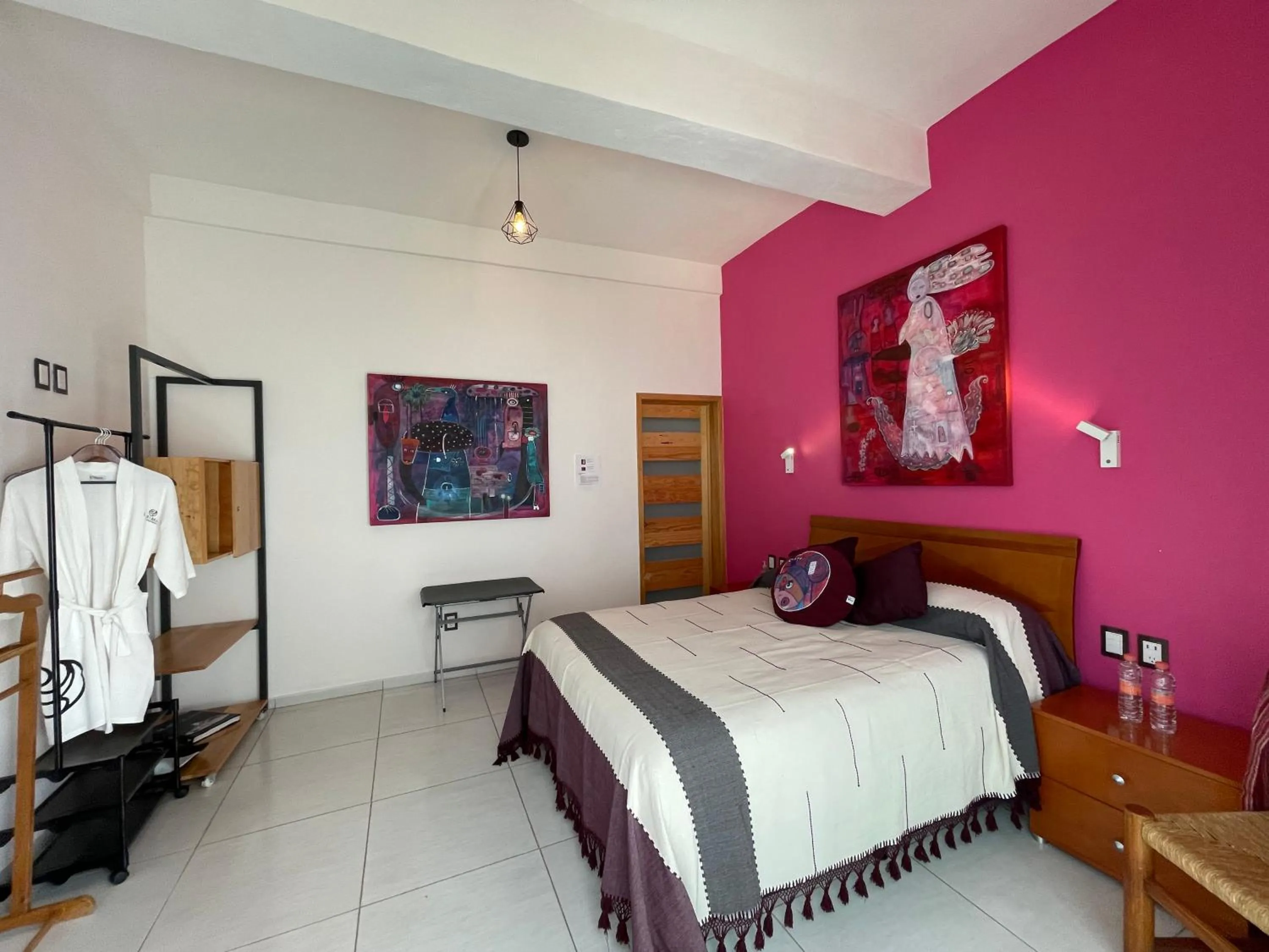 Bed in LARIMAR Gallery y Hotel Boutique
