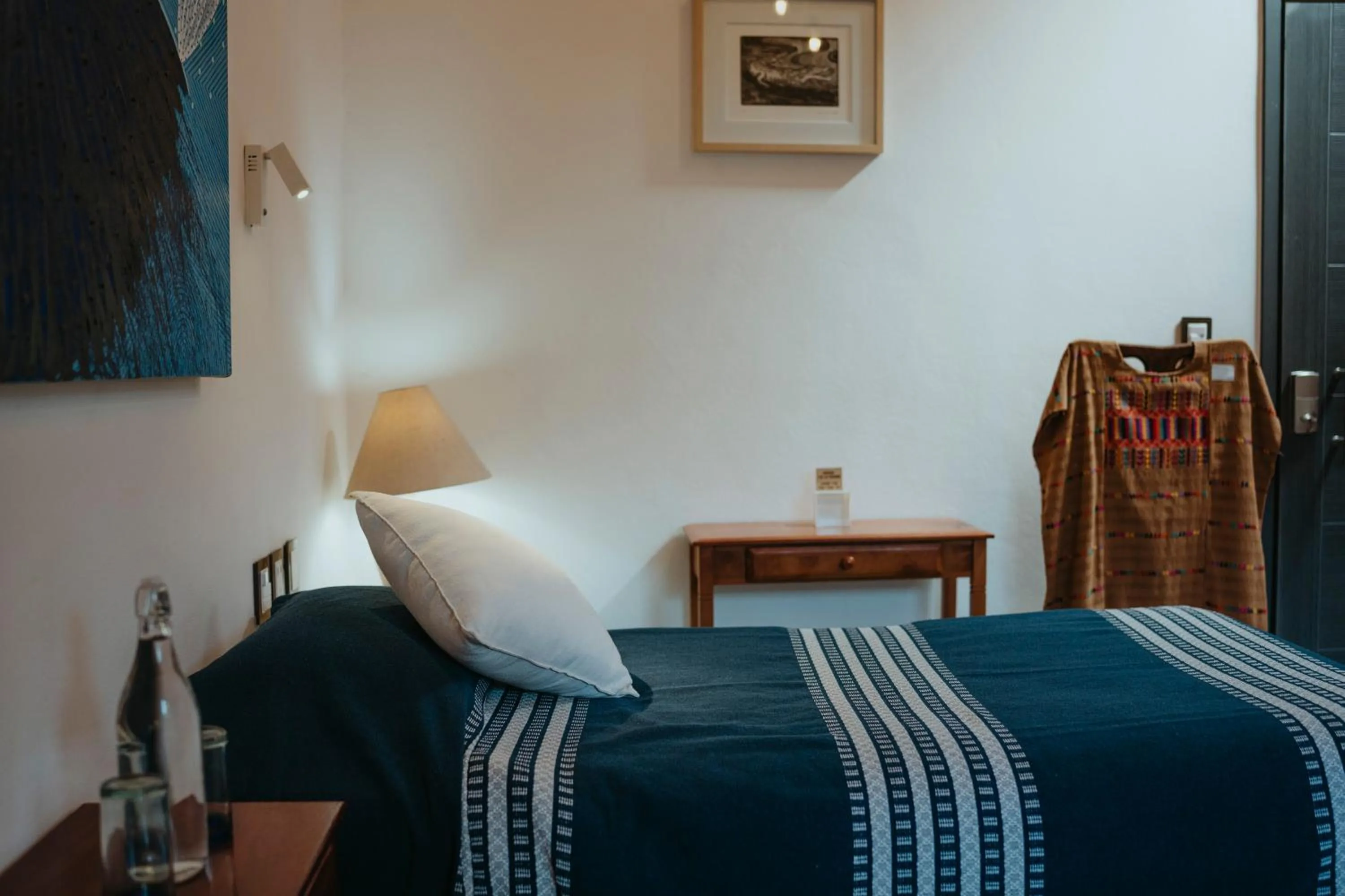 Bed in LARIMAR Gallery y Hotel Boutique