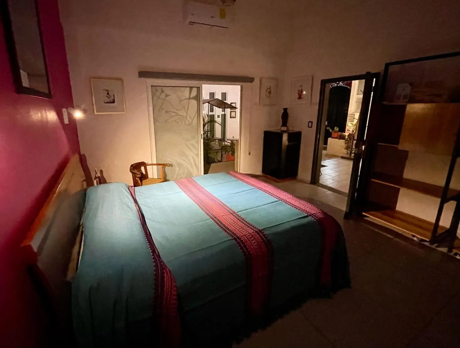 Bed in LARIMAR Gallery y Hotel Boutique