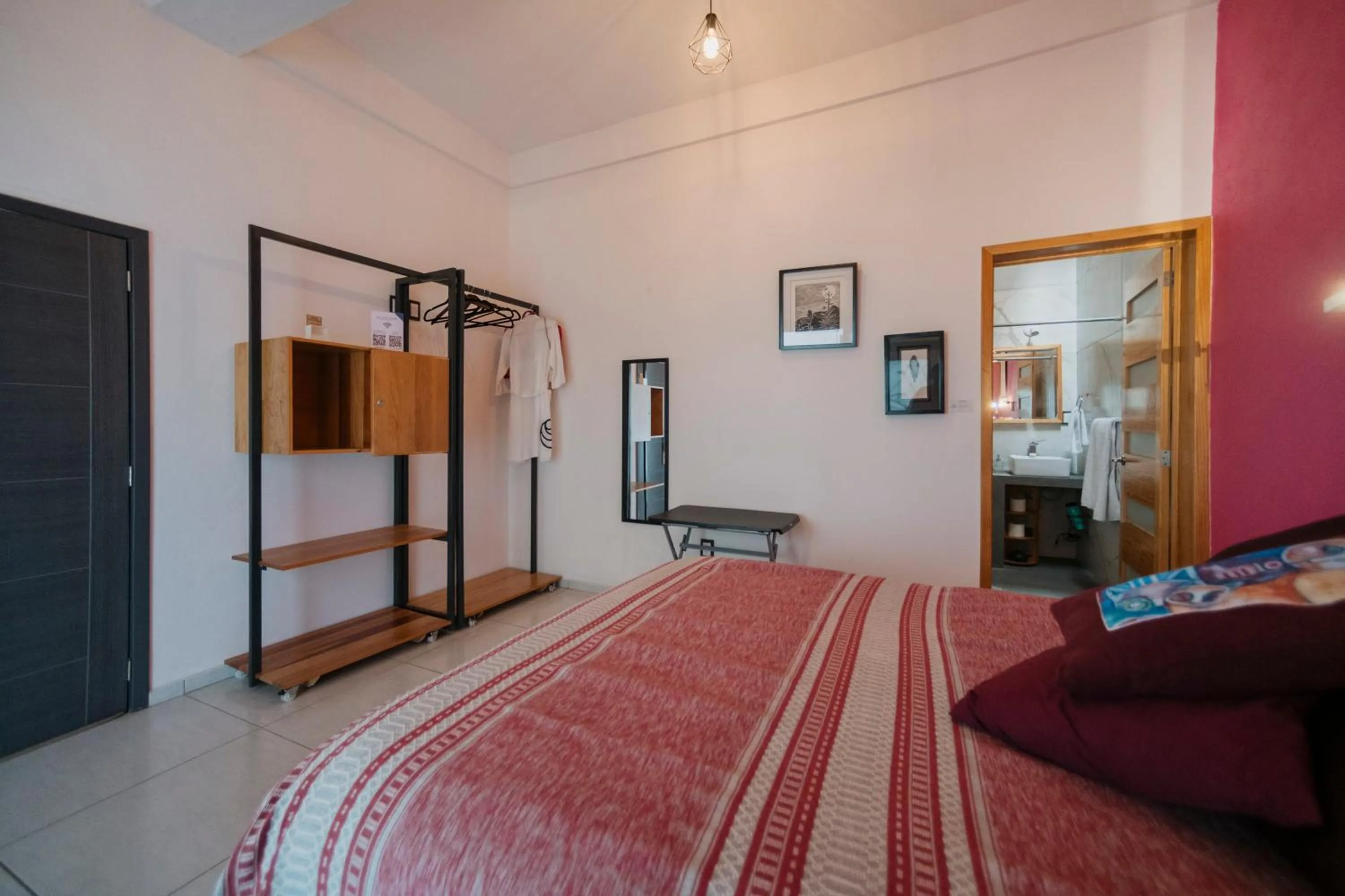 Bed in LARIMAR Gallery y Hotel Boutique