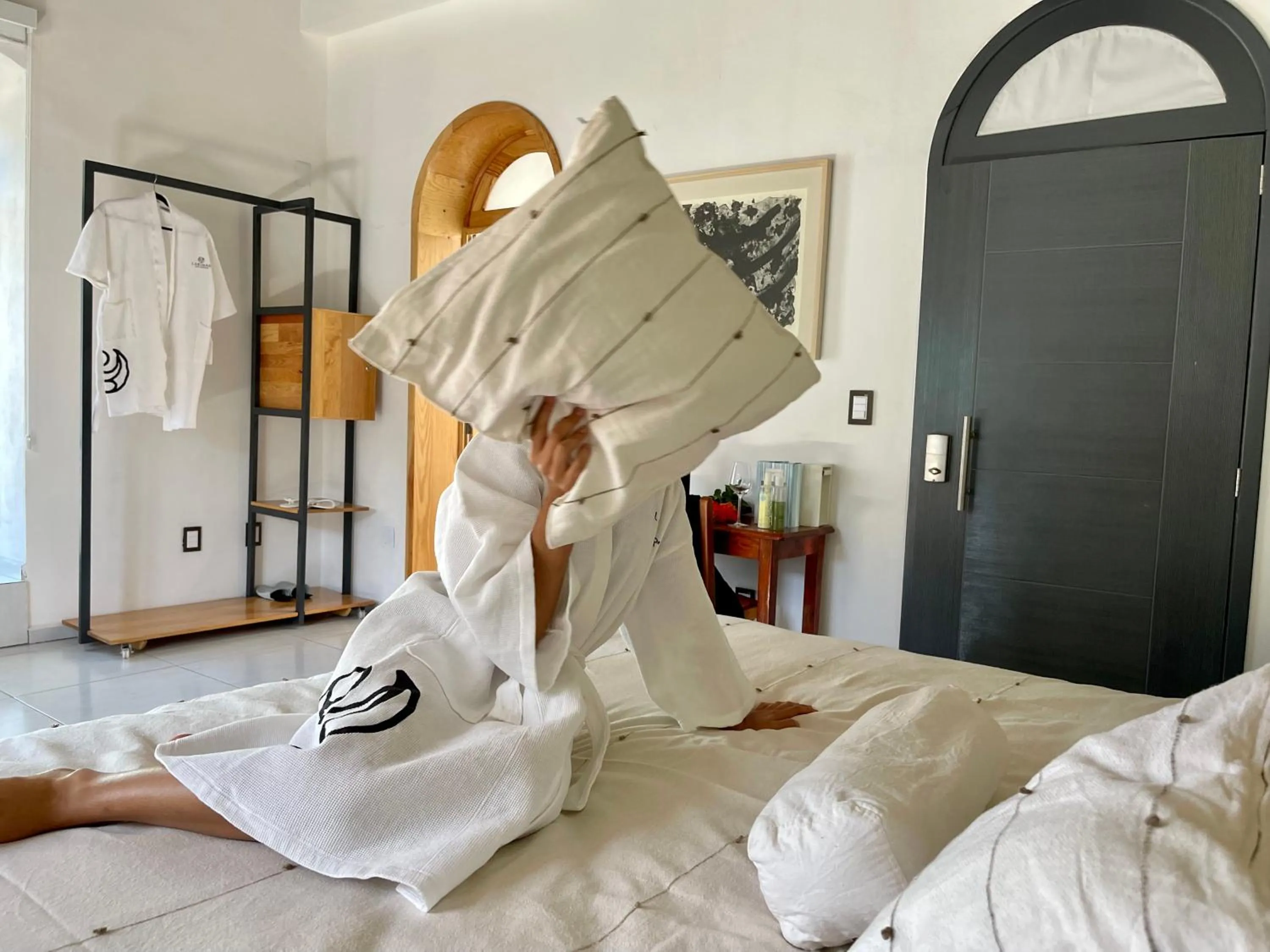 Bed in LARIMAR Gallery y Hotel Boutique