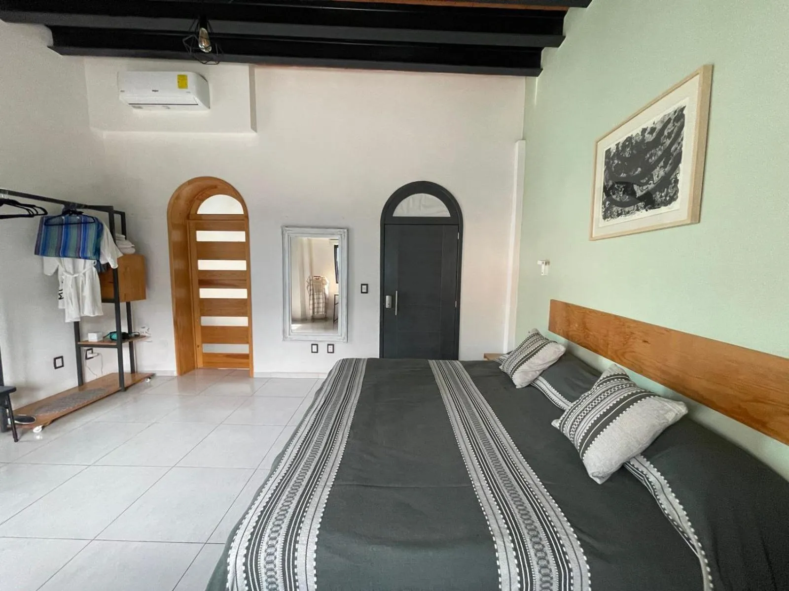 Bed in LARIMAR Gallery y Hotel Boutique