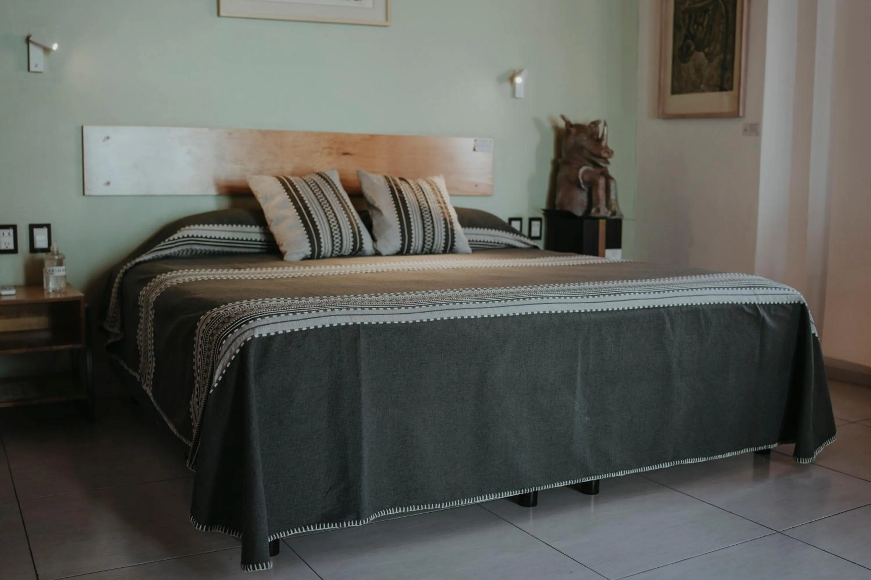Bed in LARIMAR Gallery y Hotel Boutique
