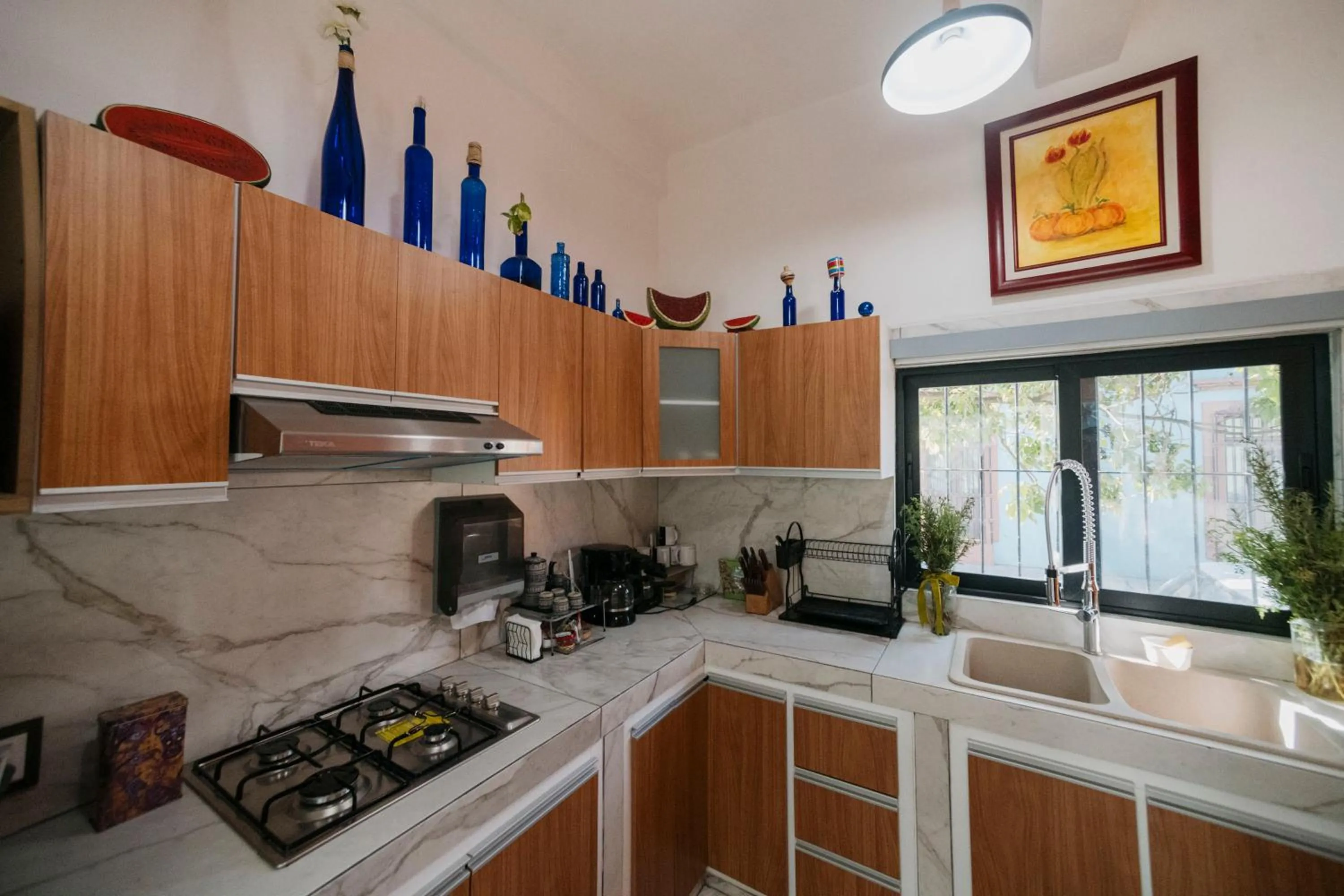 kitchen in LARIMAR Gallery y Hotel Boutique