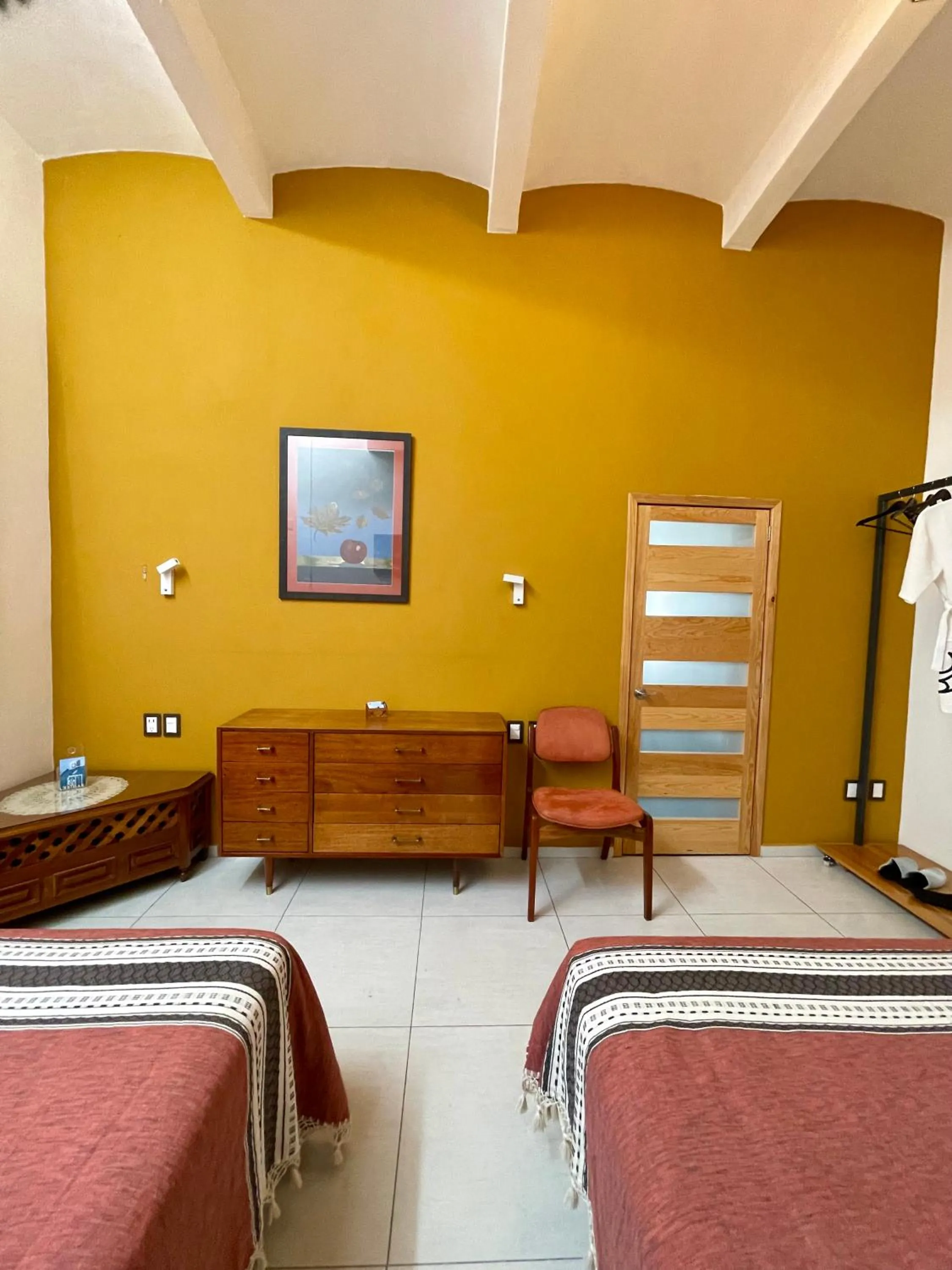 Bed in LARIMAR Gallery y Hotel Boutique