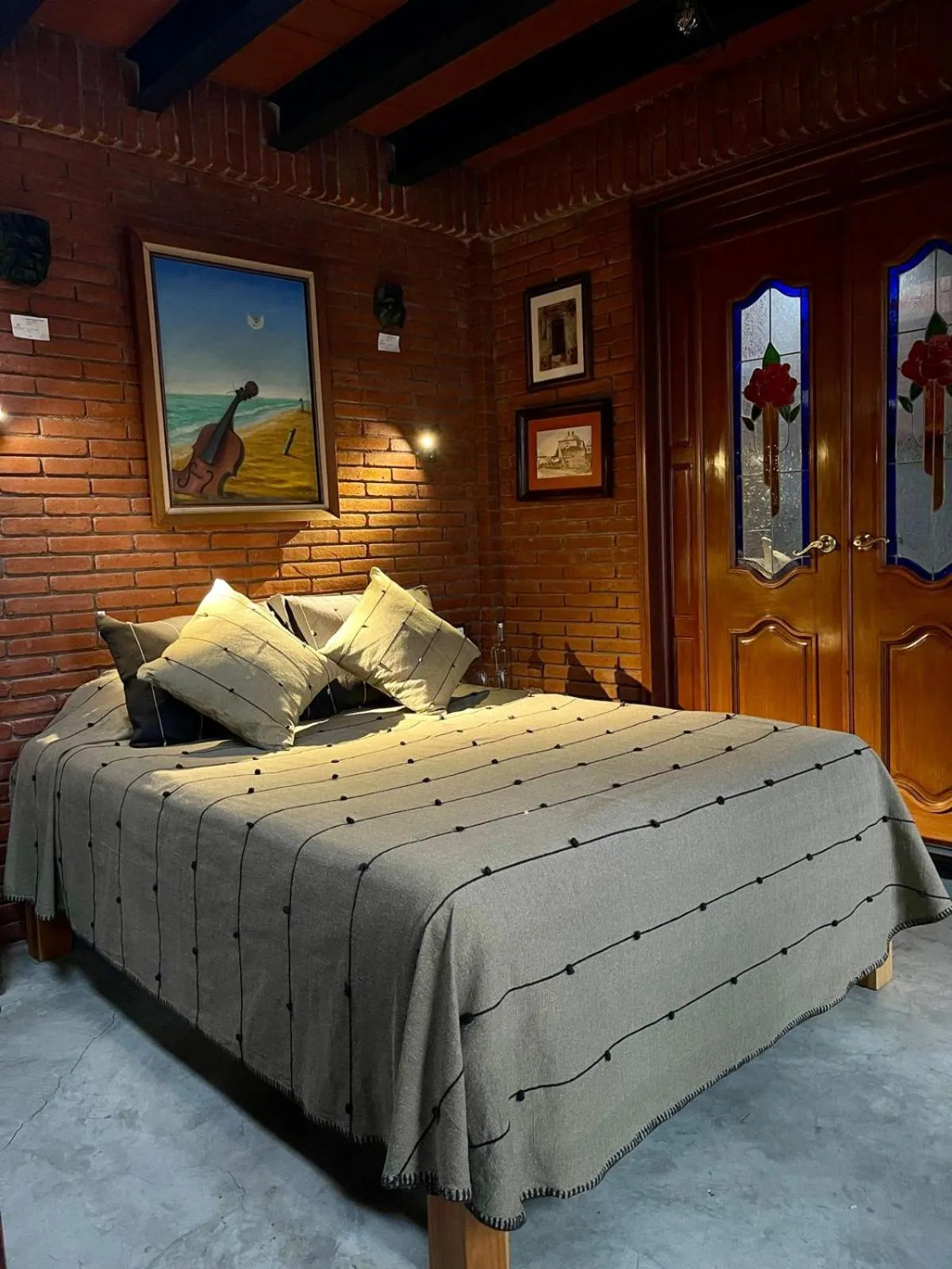 Bed in LARIMAR Gallery y Hotel Boutique