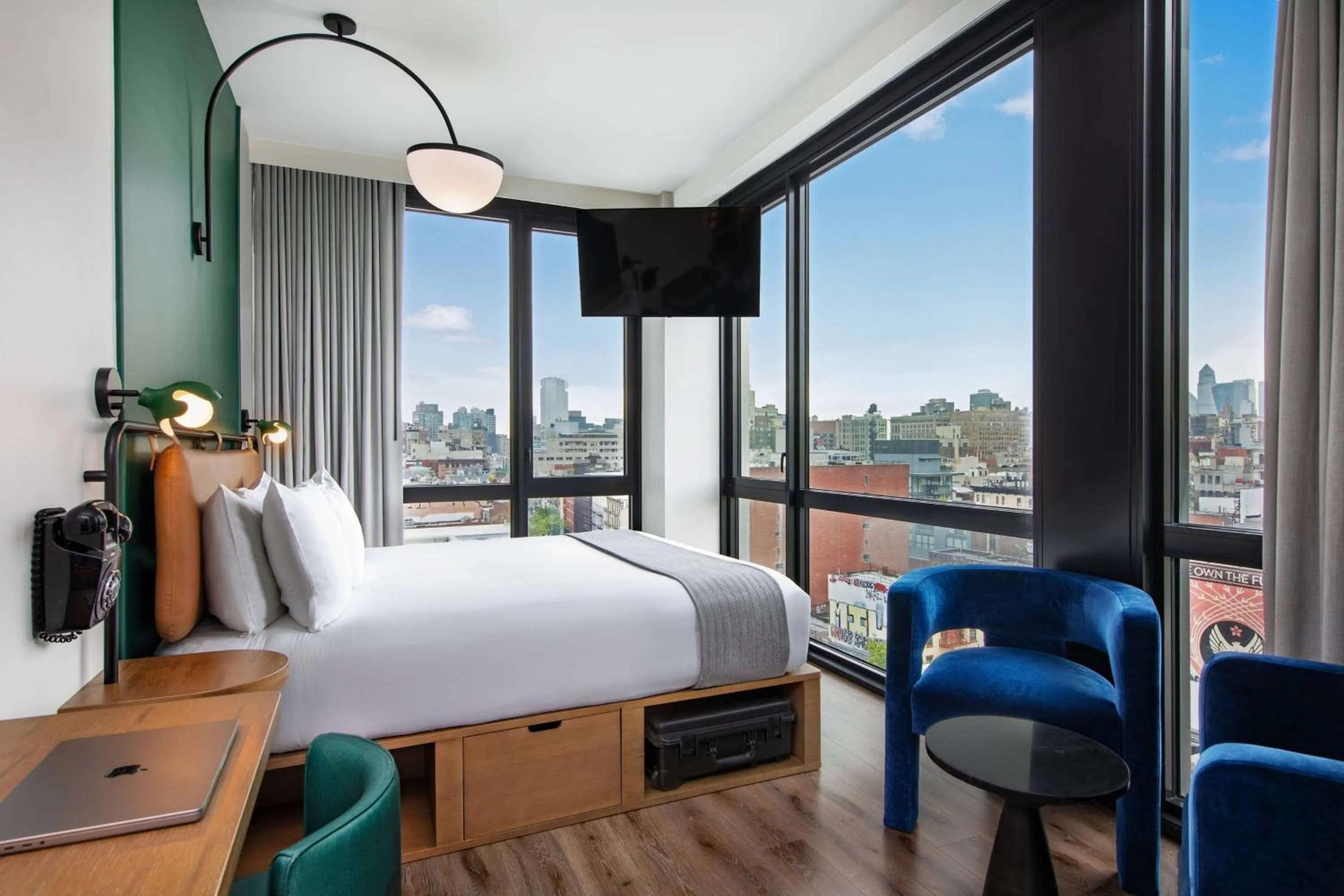 Photo of the whole room, Bed in Moxy NYC Lower East Side