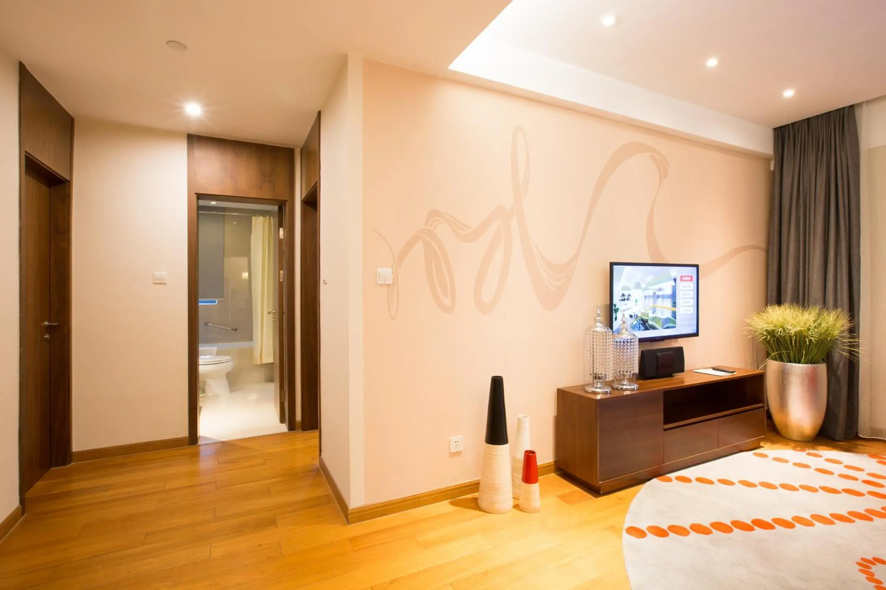 Communal lounge/ TV room, Bed in Modena By Fraser New District Wuxi Communal lounge/ TV room, Bed in Modena By Fraser New District Wuxi