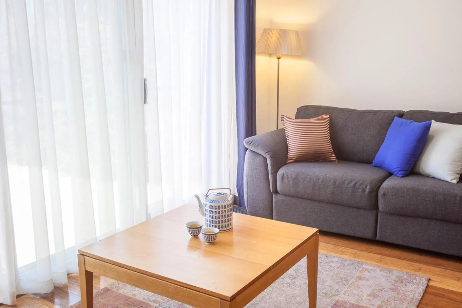 Living room, Seating Area in One of a Kind Apartments