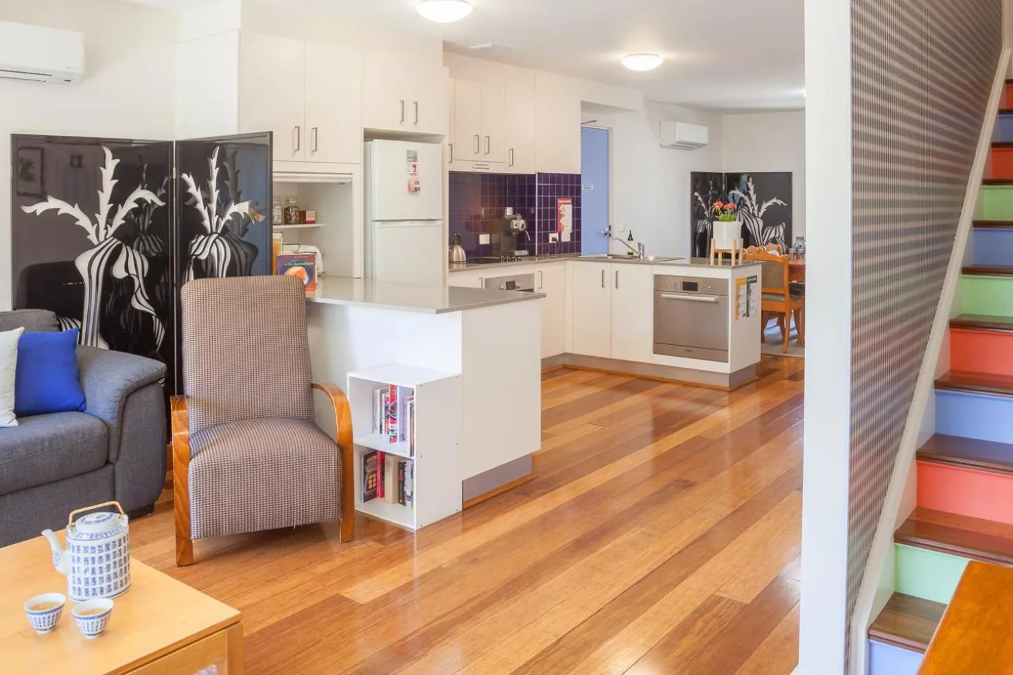 Living room, Kitchen/Kitchenette in One of a Kind Apartments