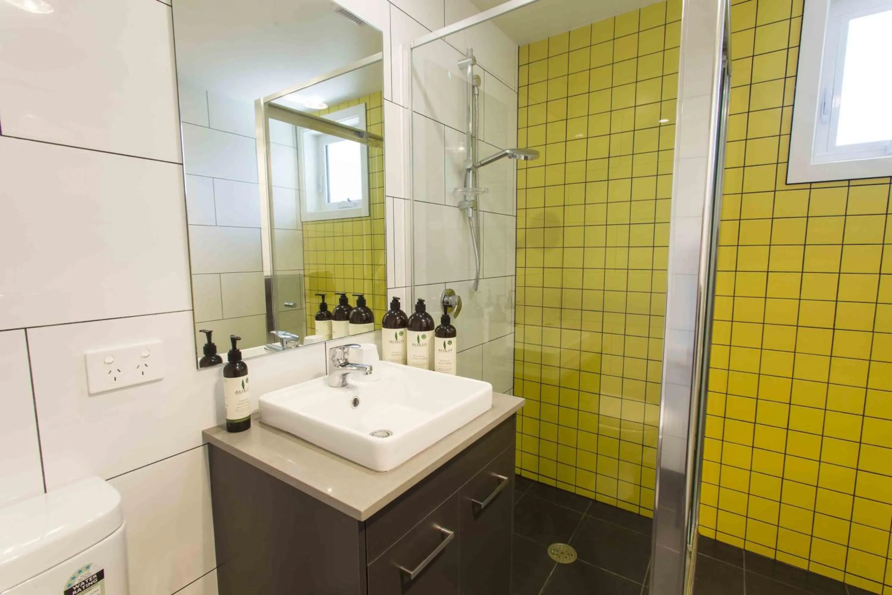 Day, Bathroom in One of a Kind Apartments