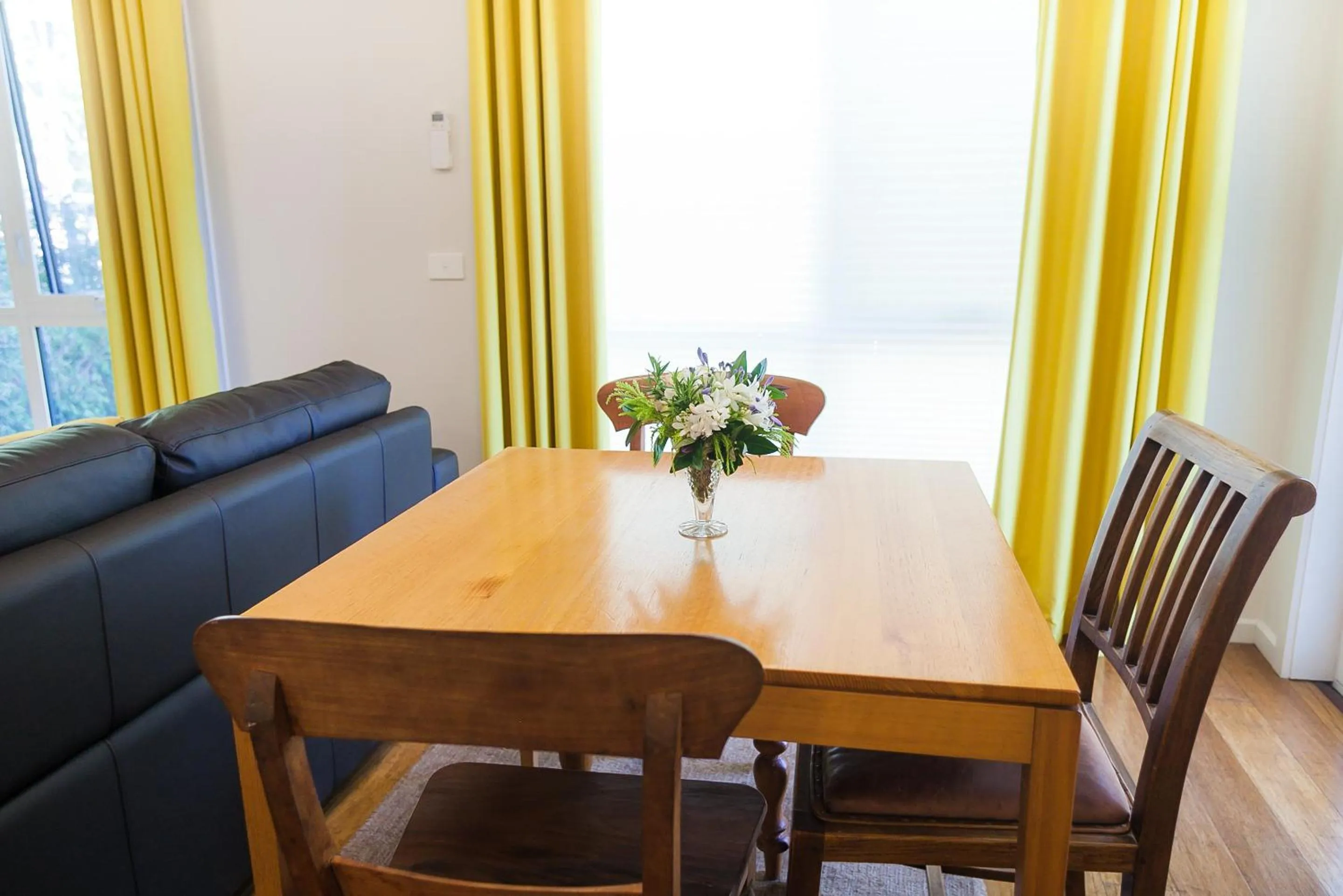 Seating area, Dining Area in One of a Kind Apartments