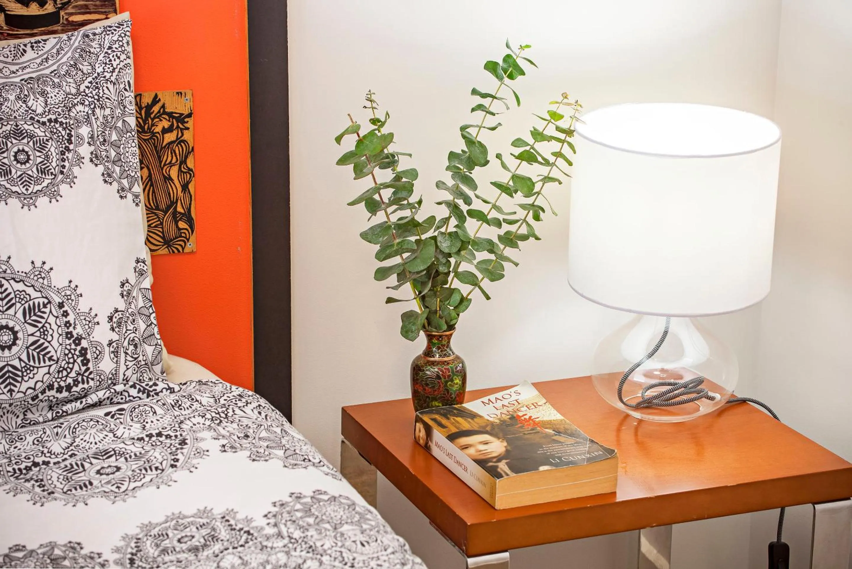 Bed, Seating Area in One of a Kind Apartments