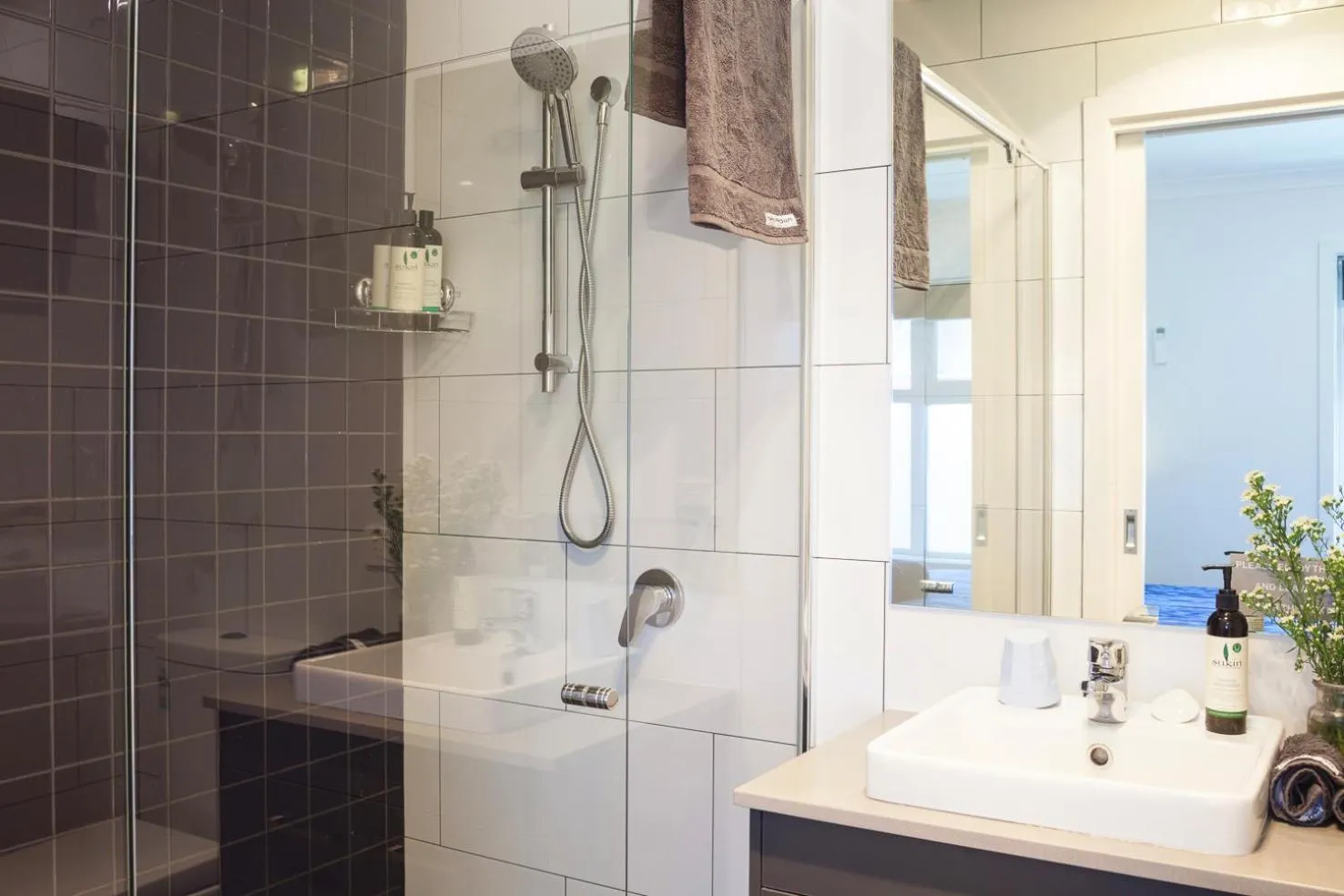 Shower, Bathroom in One of a Kind Apartments