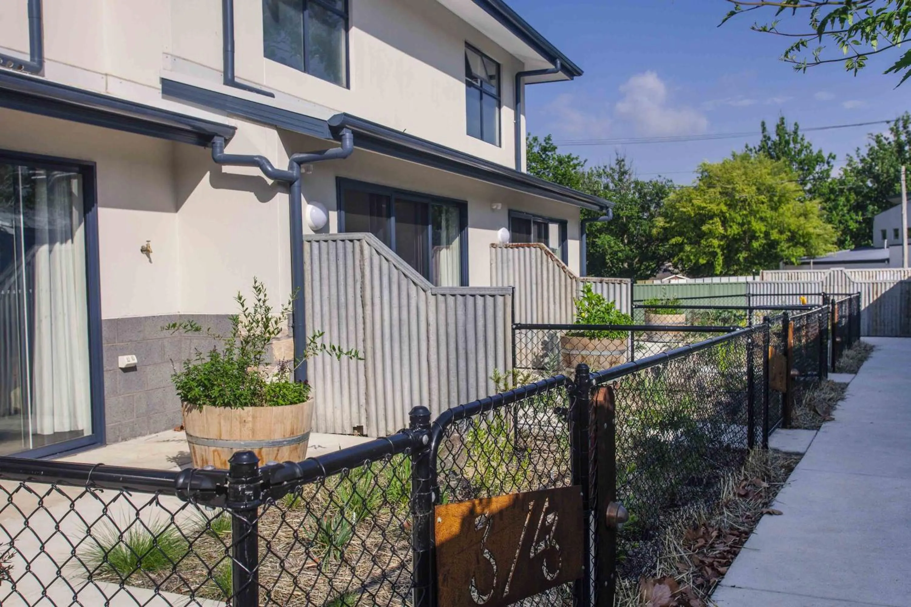 Facade/entrance in One of a Kind Apartments