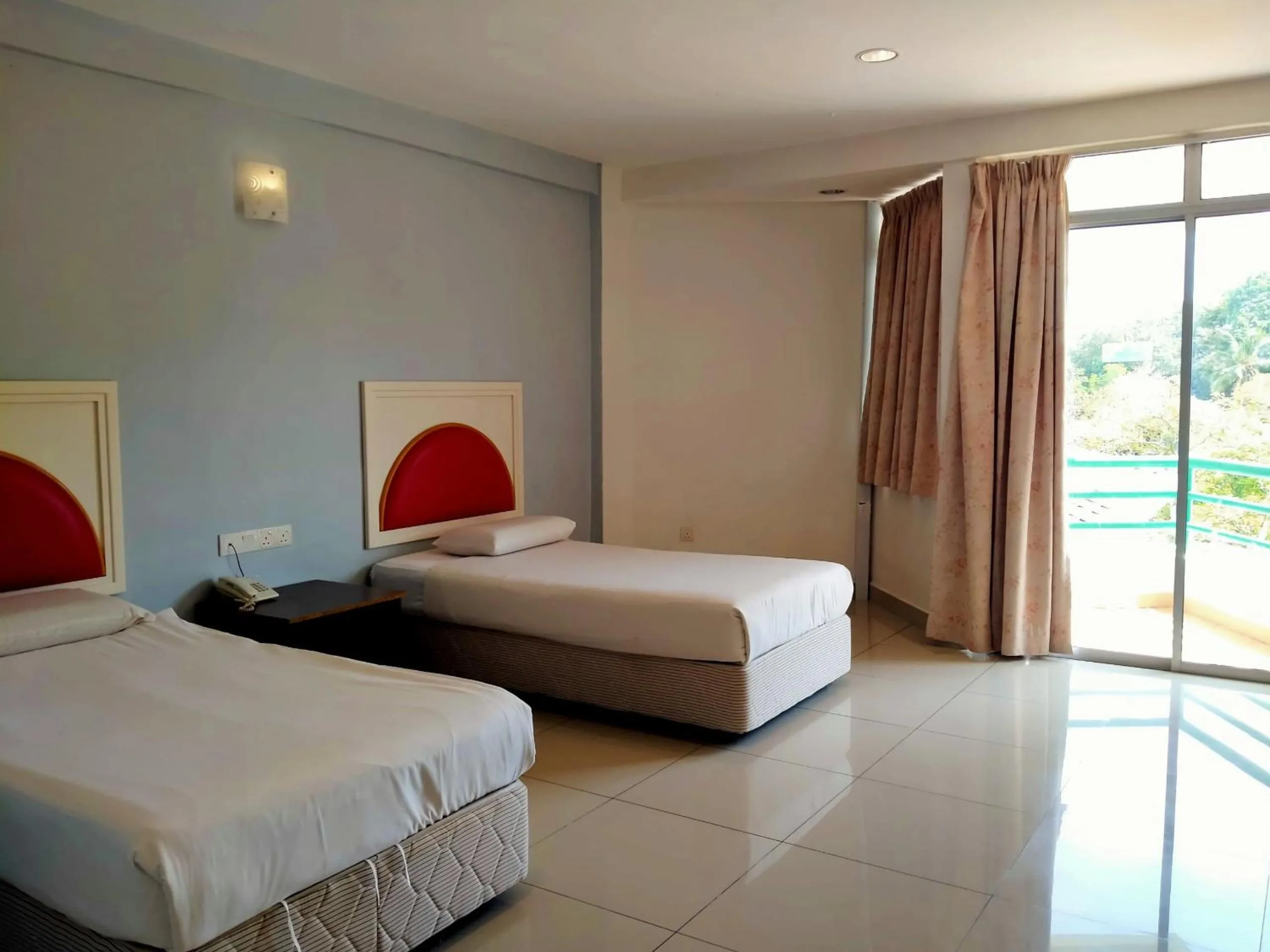 Bed in Akar Beach Resort