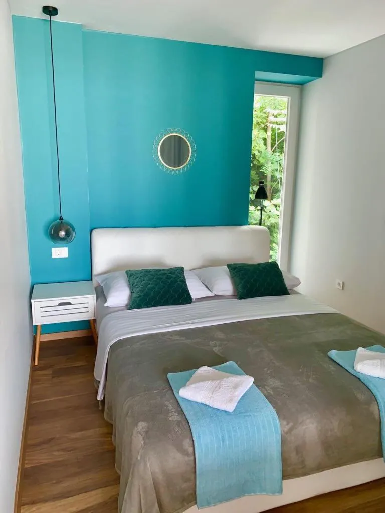 Bed in Deluxe Suites Mandić
