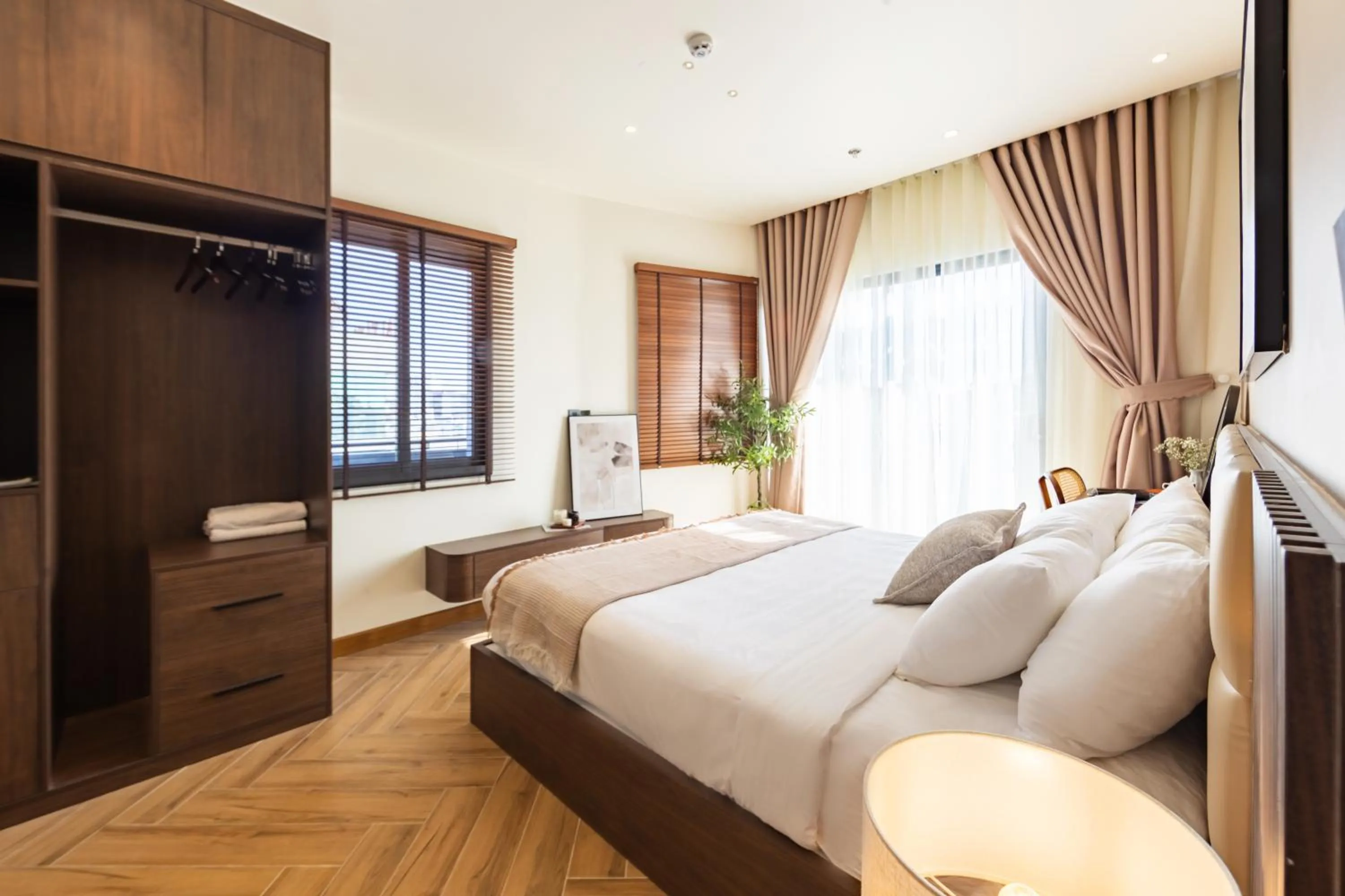 Bed in TTR Central Apart Hotel