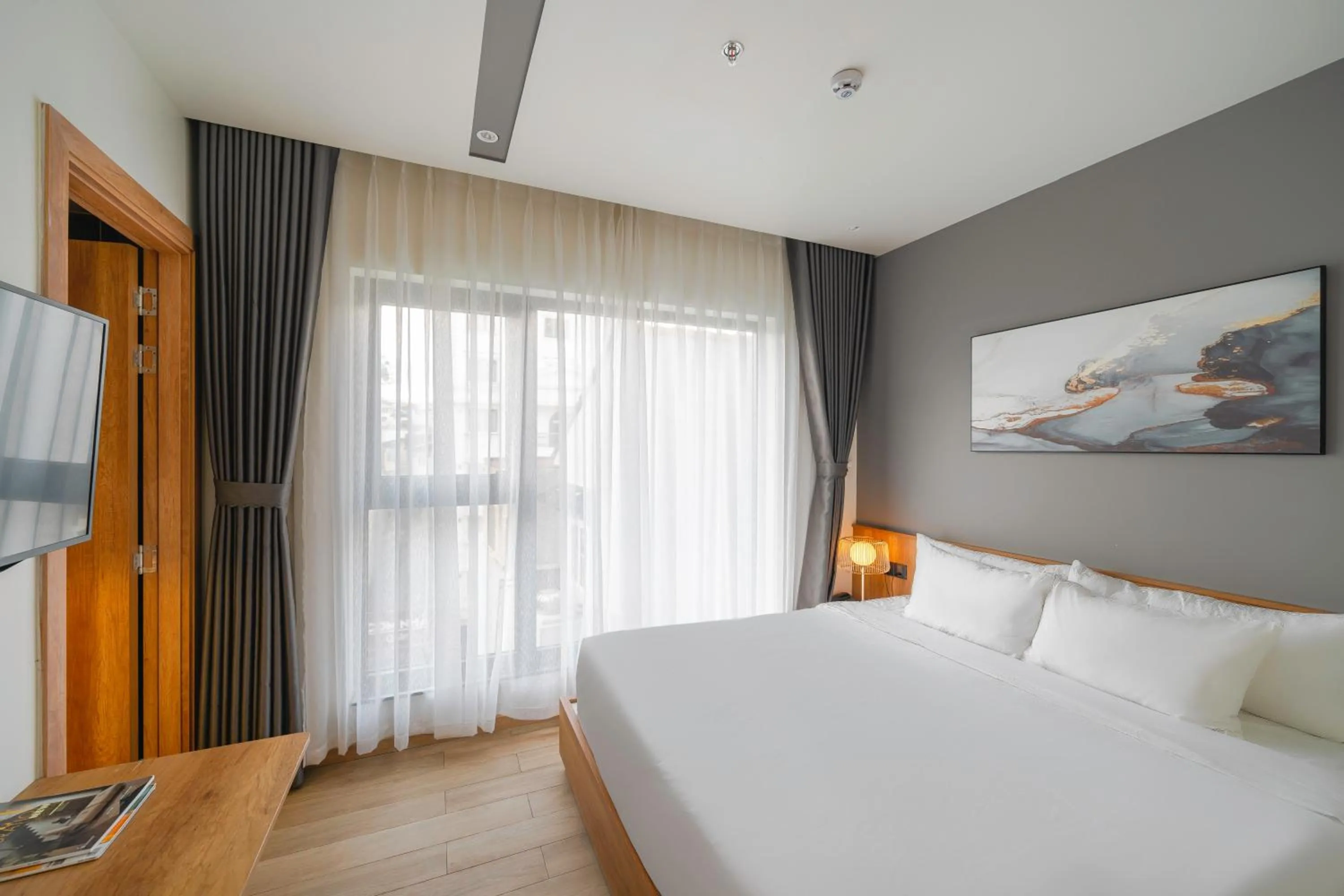 Bed in TTR Central Apart Hotel