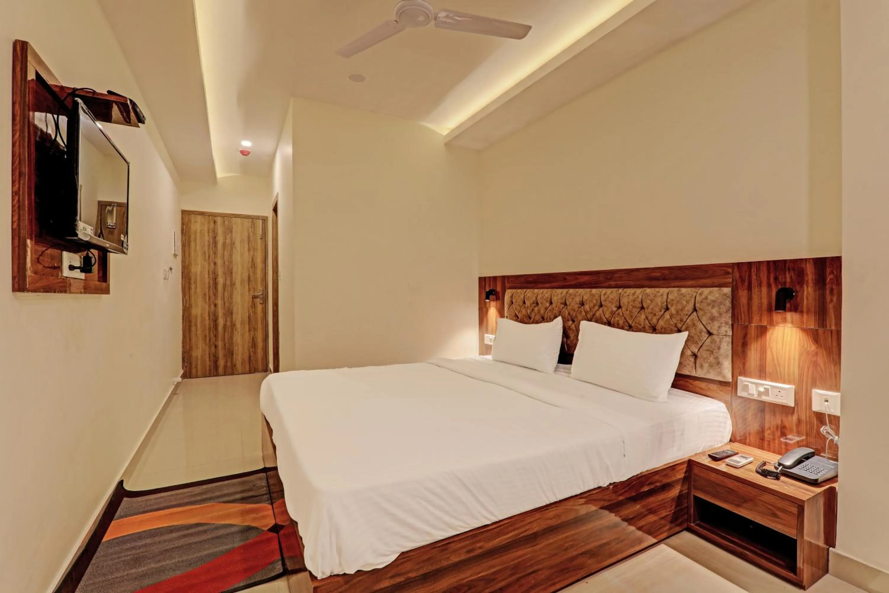 Photo of the whole room, Bed in Hotel Heera Grand