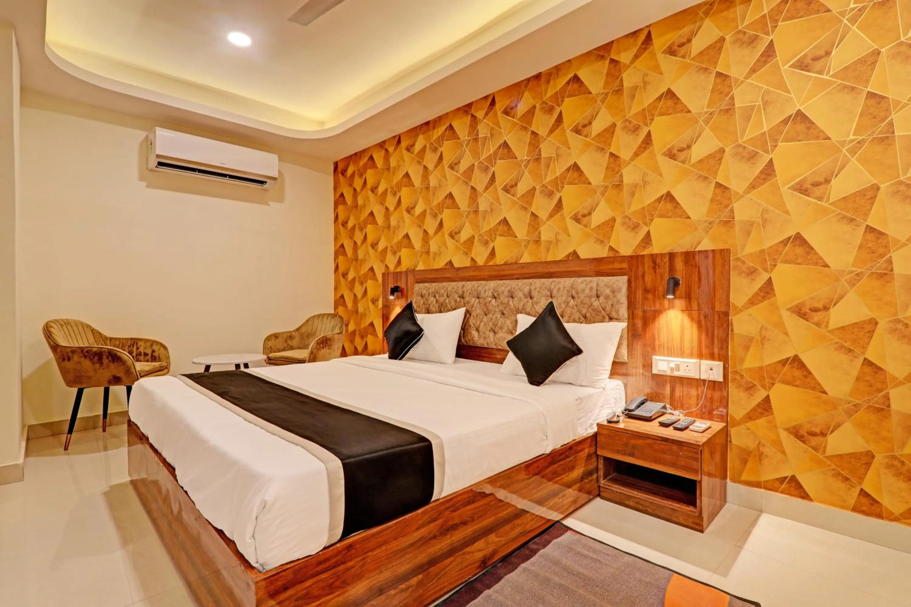 Photo of the whole room, Bed in Hotel Heera Grand