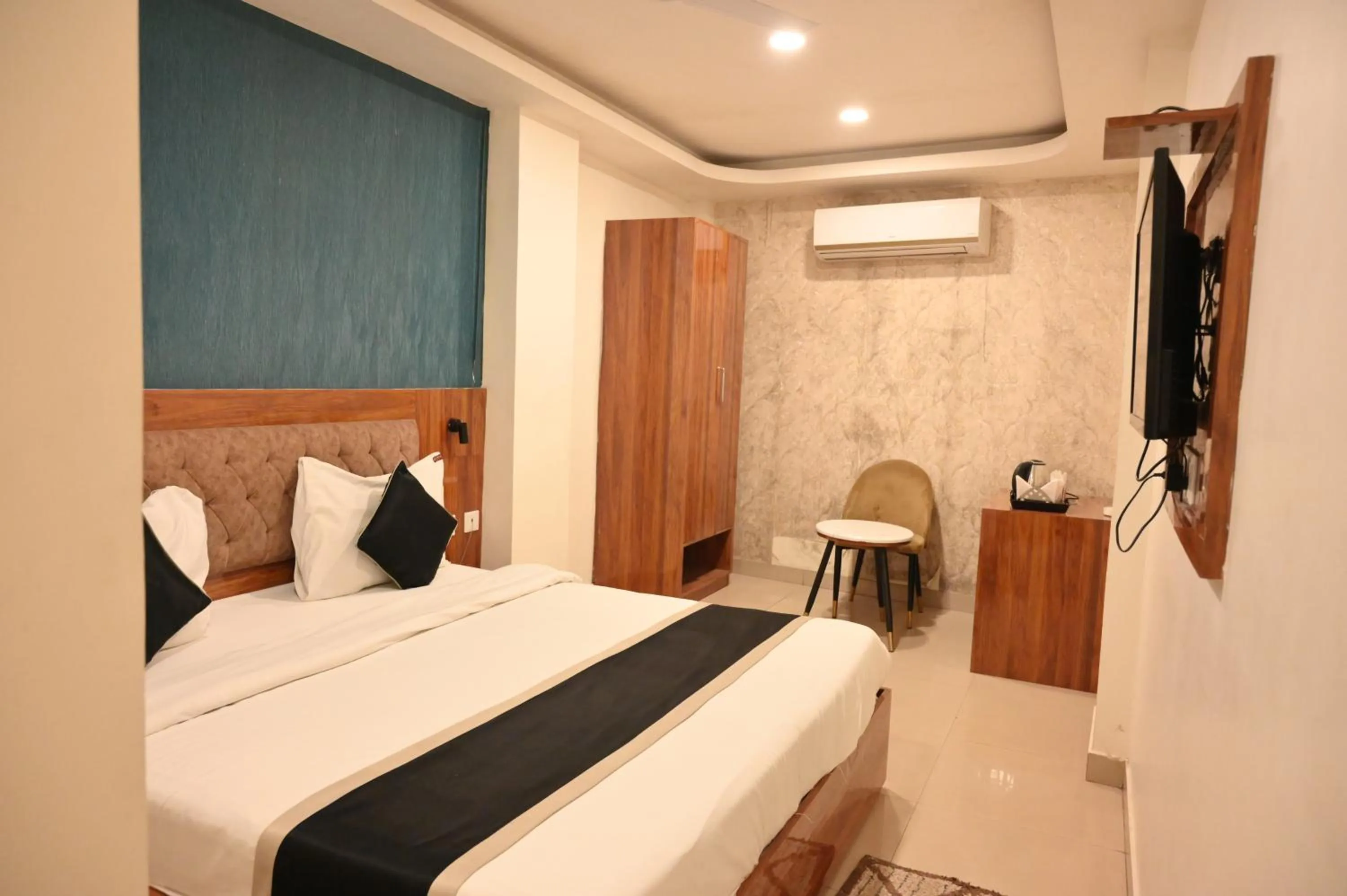 Photo of the whole room, Bed in Hotel Heera Grand