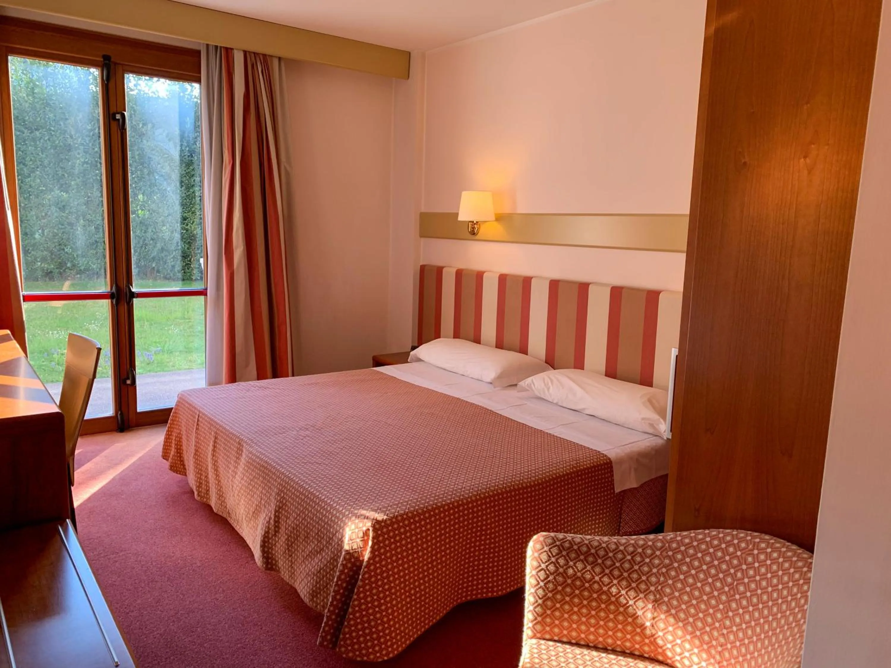 Bedroom, Bed in Eurohotel Palace Maniago