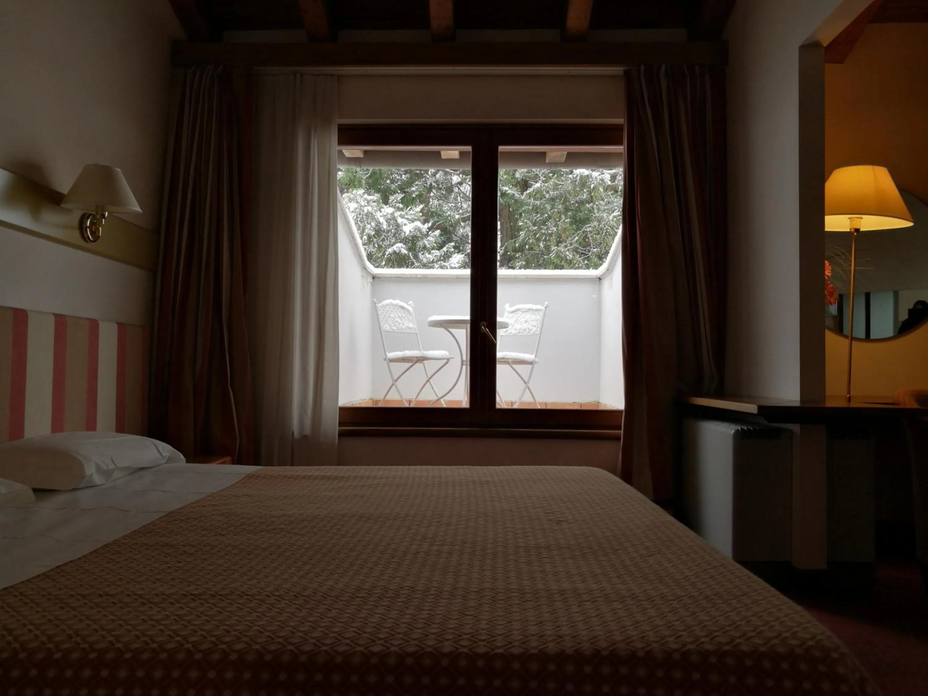 Bed in Eurohotel Palace Maniago