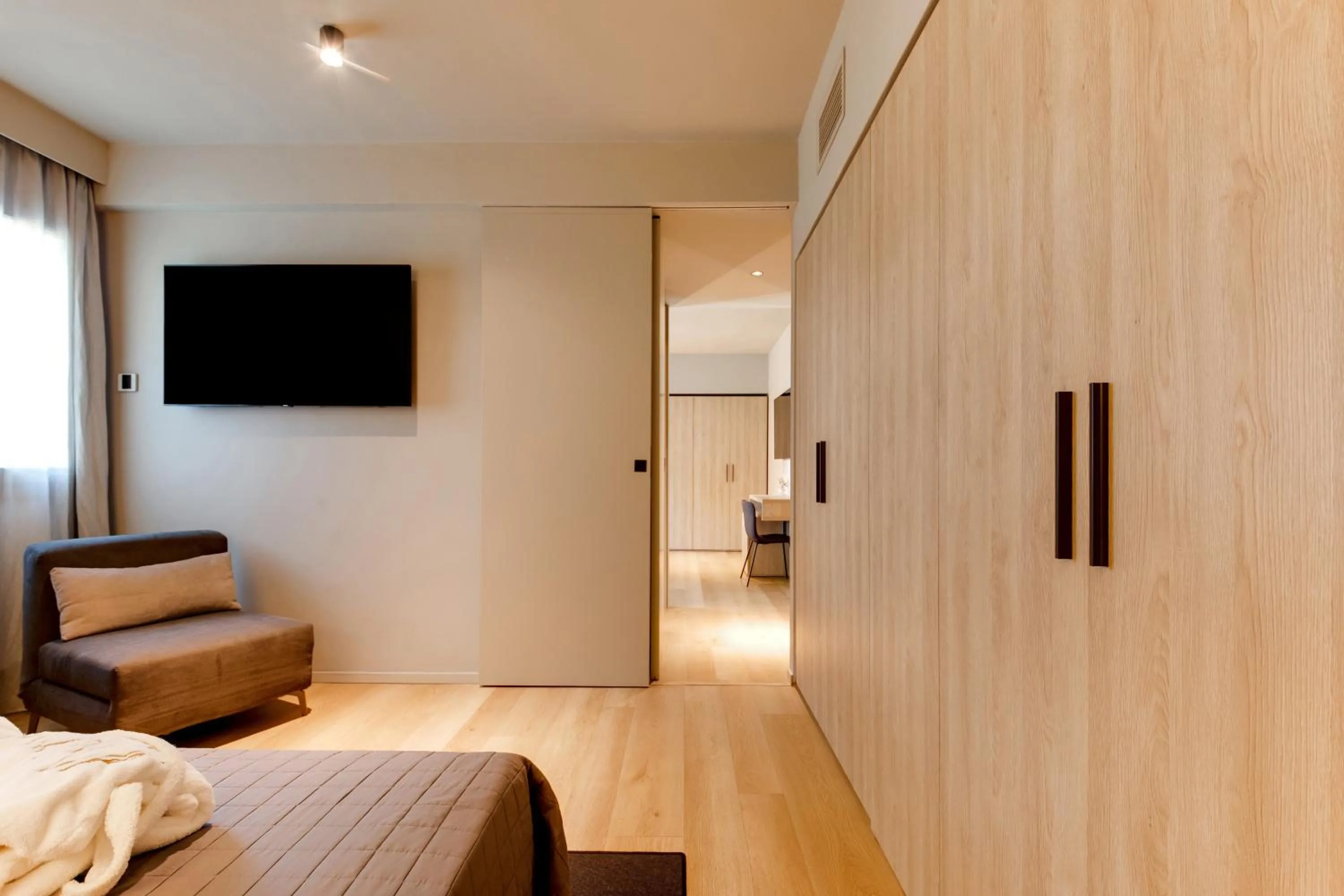 Bed in Mima Aparthotel Boutique & Spa