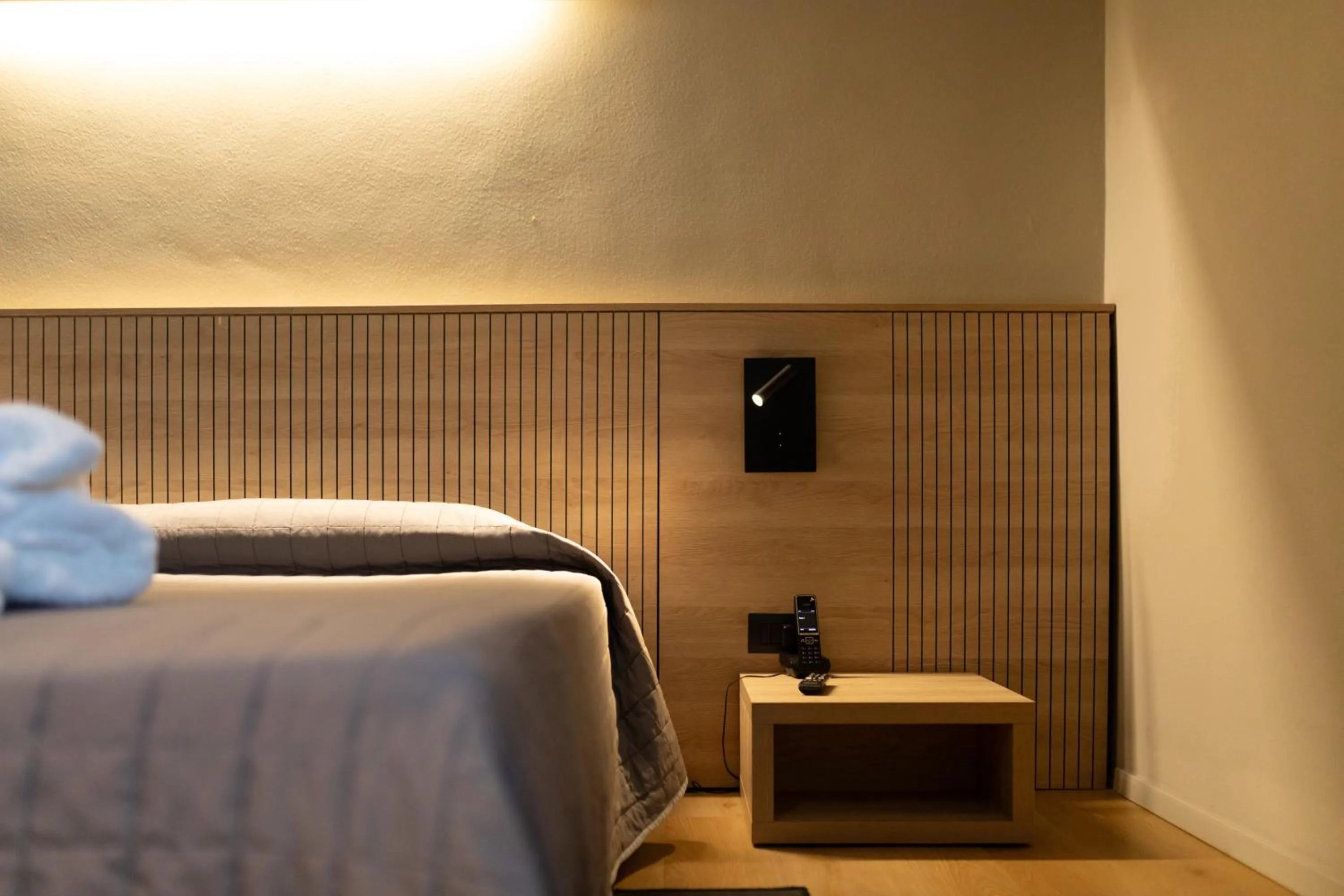 Bed in Mima Aparthotel Boutique & Spa