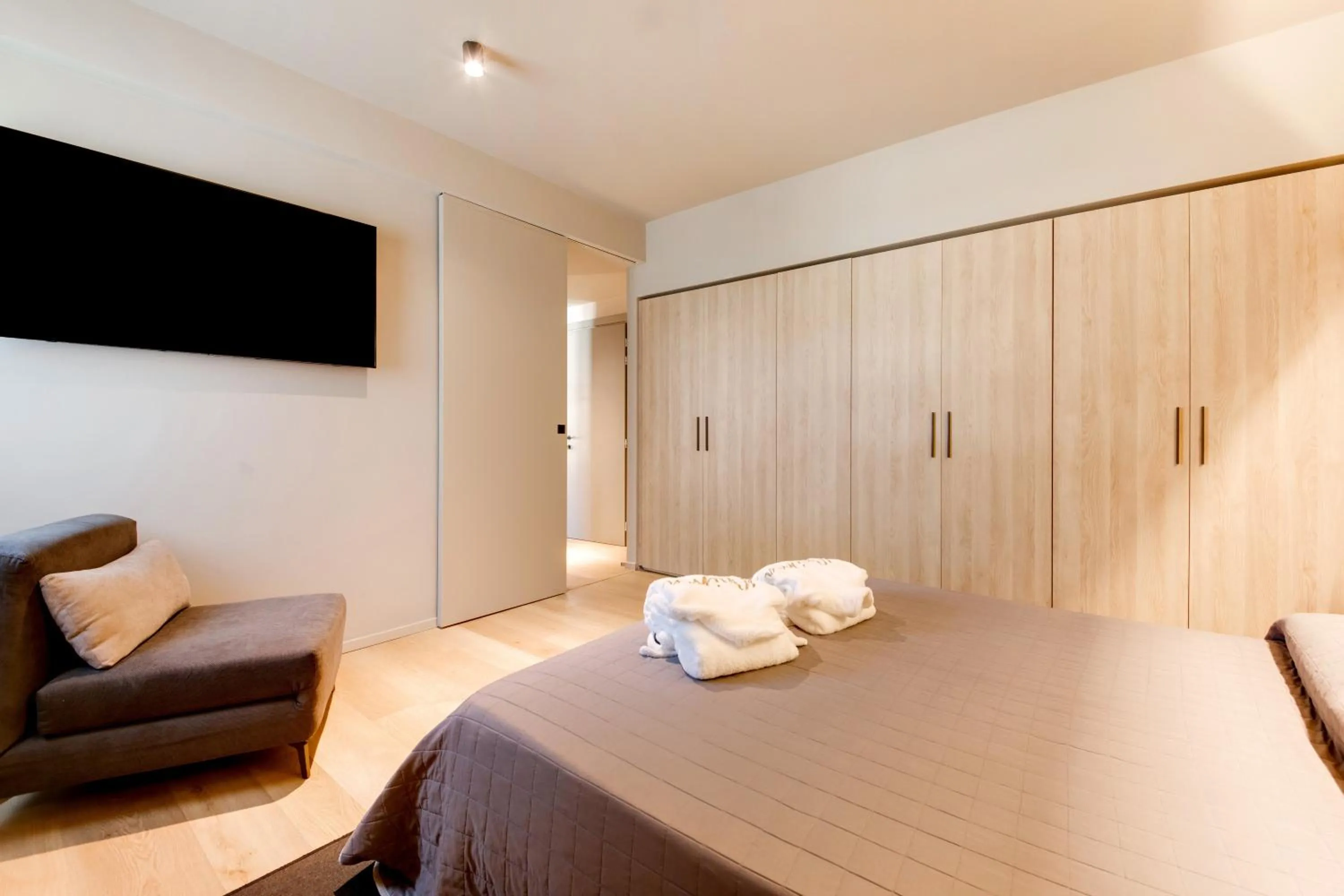 Bed in Mima Aparthotel Boutique & Spa