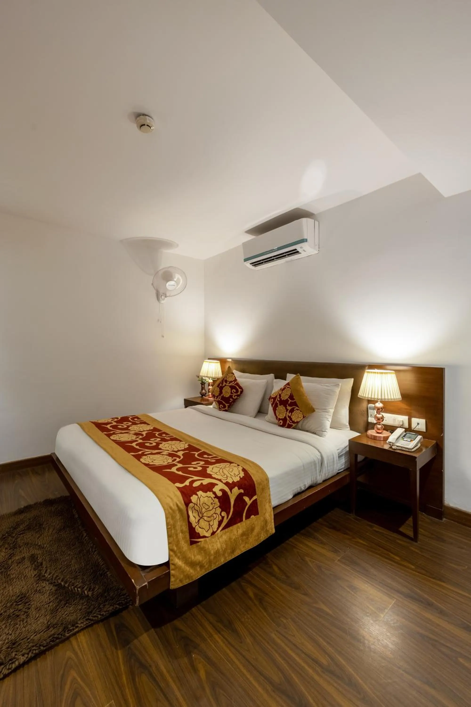 Bed in Hotel Arch Plaza at Yashobhoomi By Arch Group