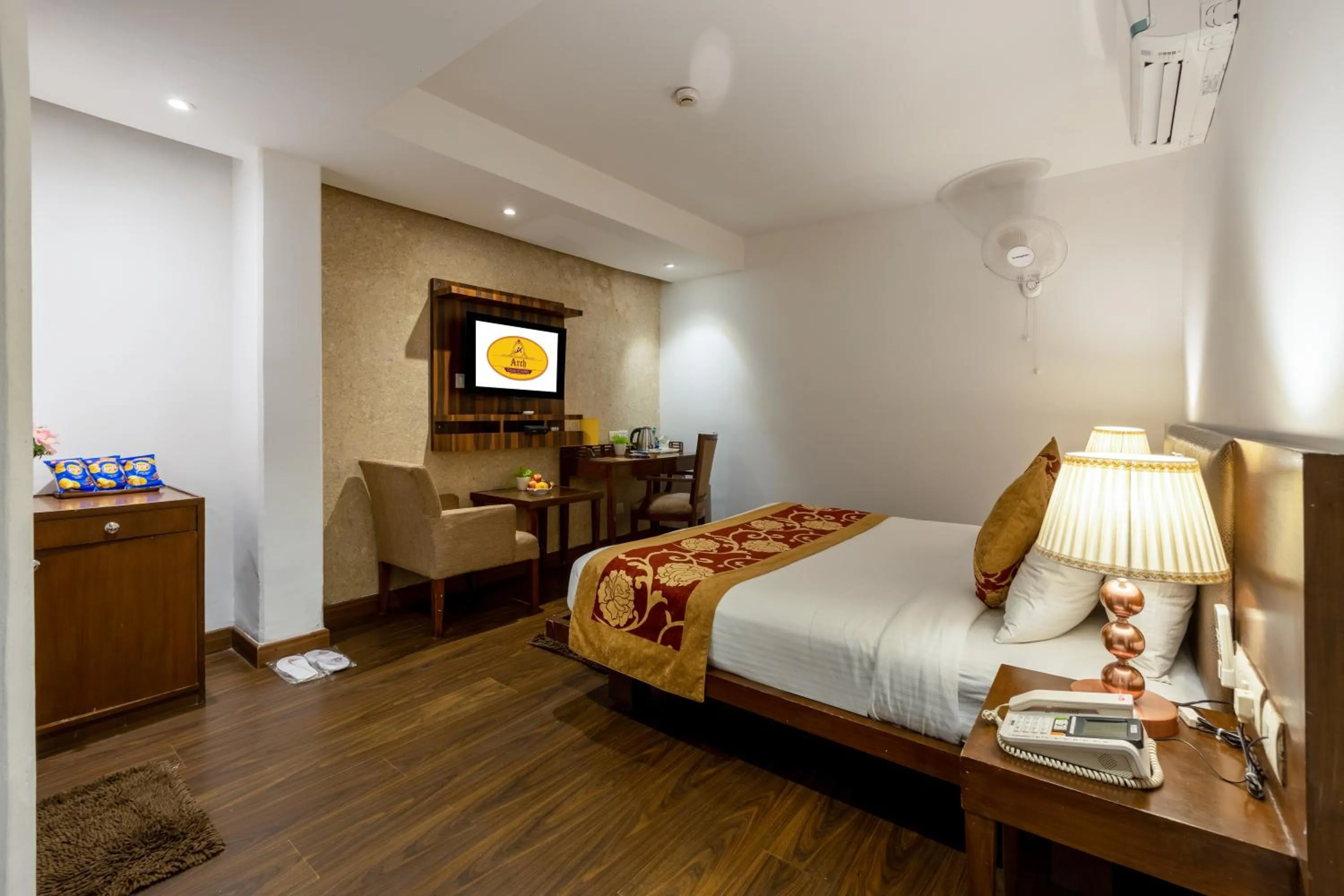 Bed in Hotel Arch Plaza at Yashobhoomi By Arch Group