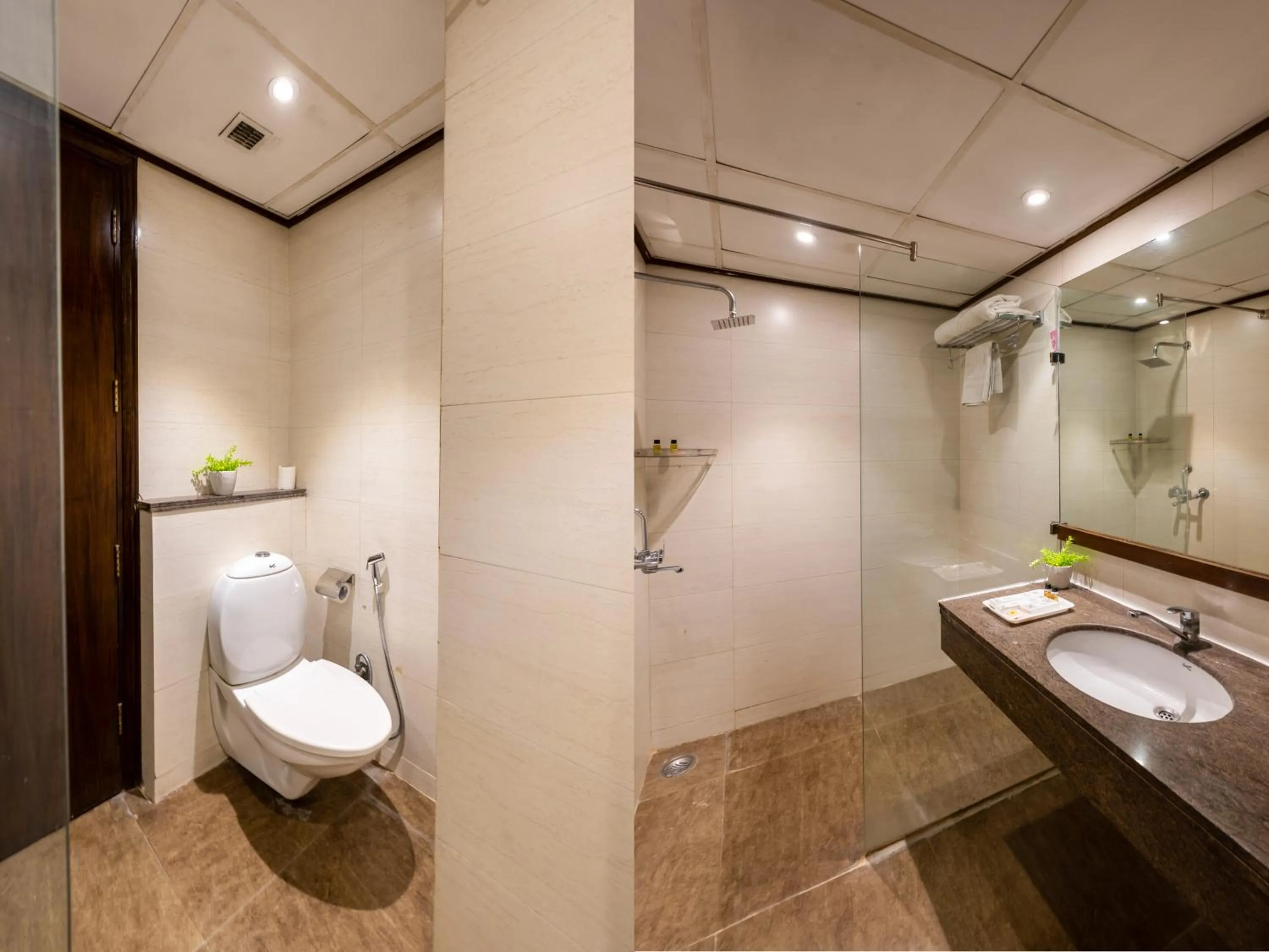 Bathroom in Hotel Arch Plaza at Yashobhoomi By Arch Group