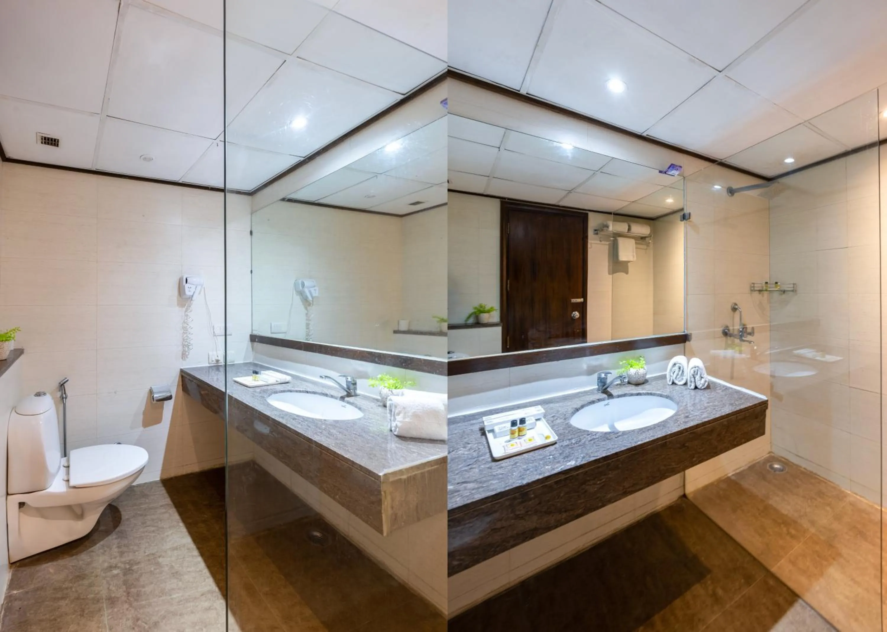 Shower in Hotel Arch Plaza at Yashobhoomi By Arch Group