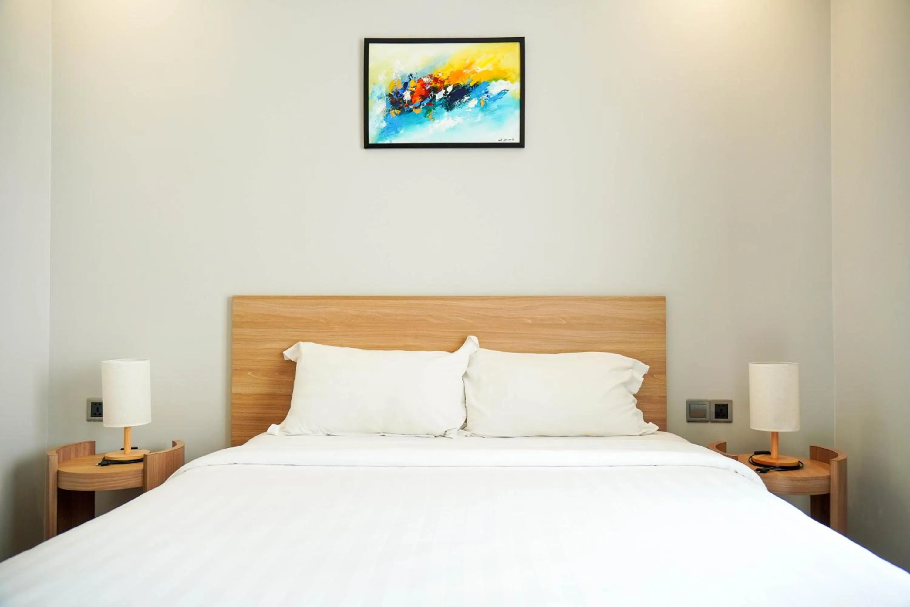 Bed in Le Cap Gym Hotel & Apartments