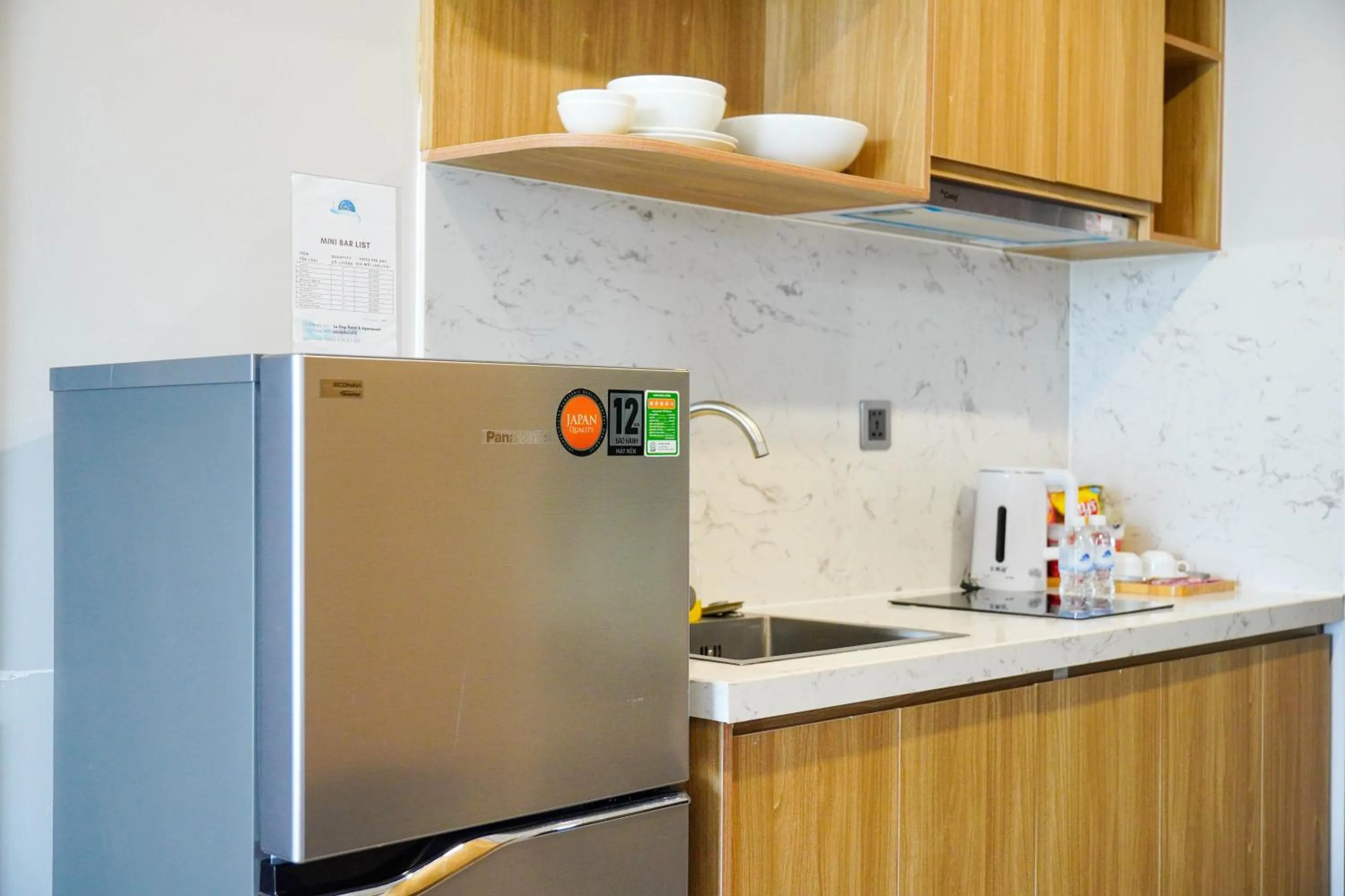 Kitchen or kitchenette in Le Cap Gym Hotel & Apartments