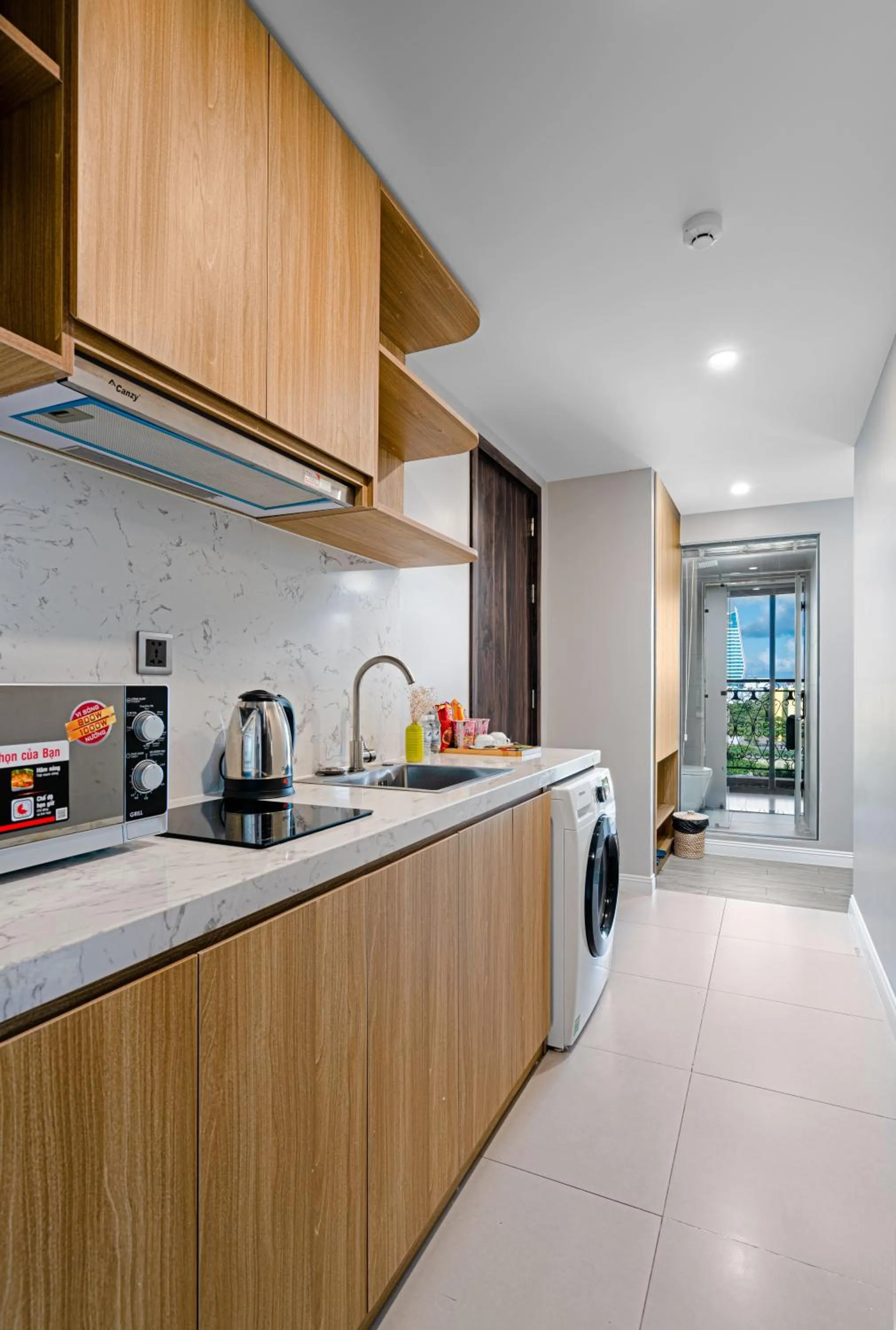 Kitchen or kitchenette in Le Cap Gym Hotel & Apartments