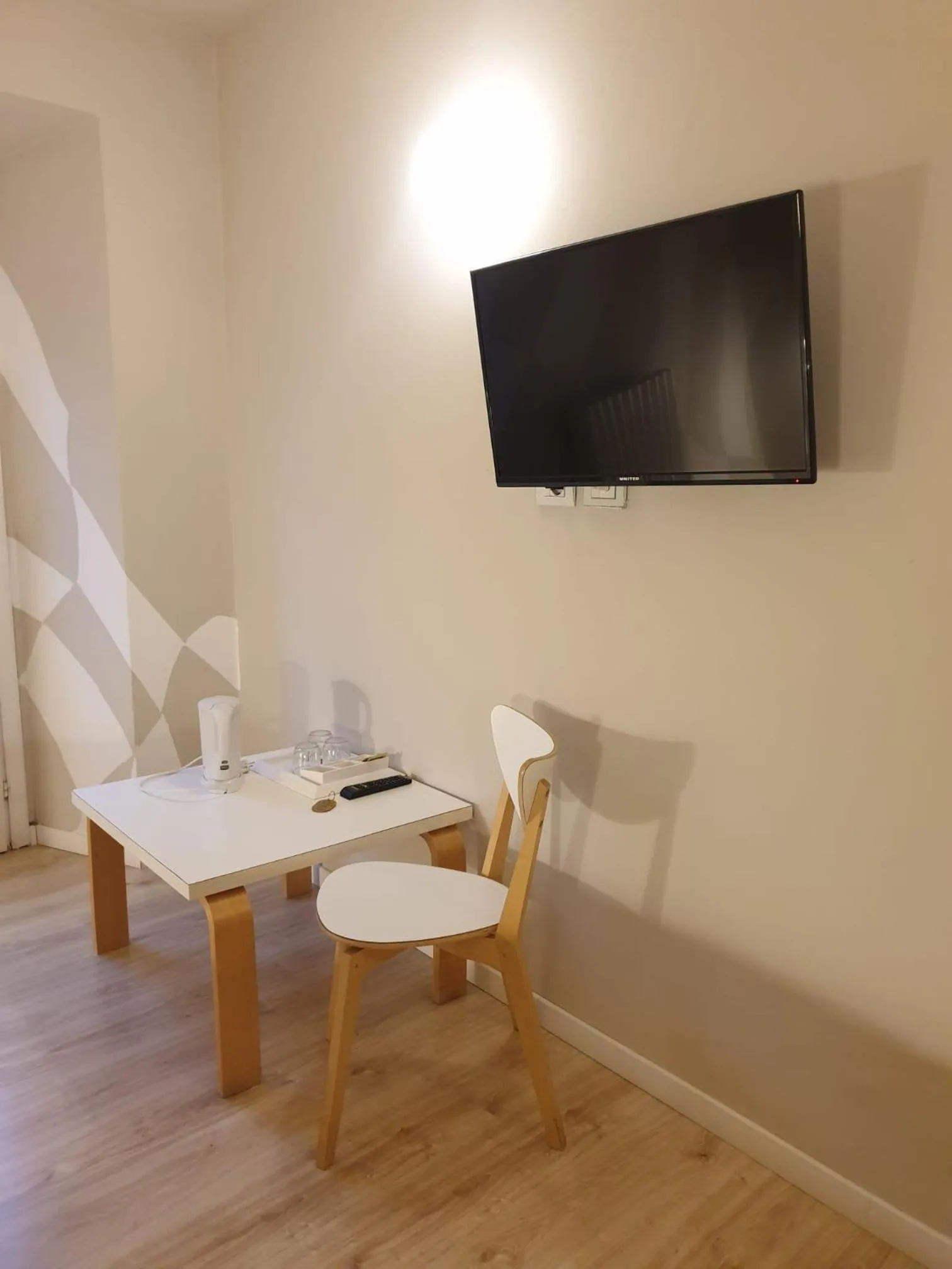 TV and multimedia in Piccolo Hotel Olina