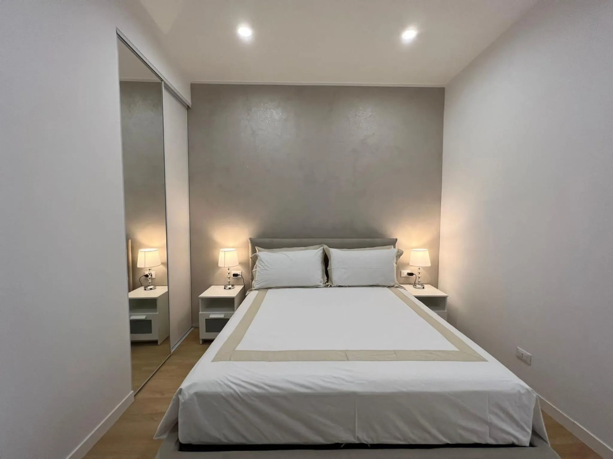 Bed in Blu Apartment