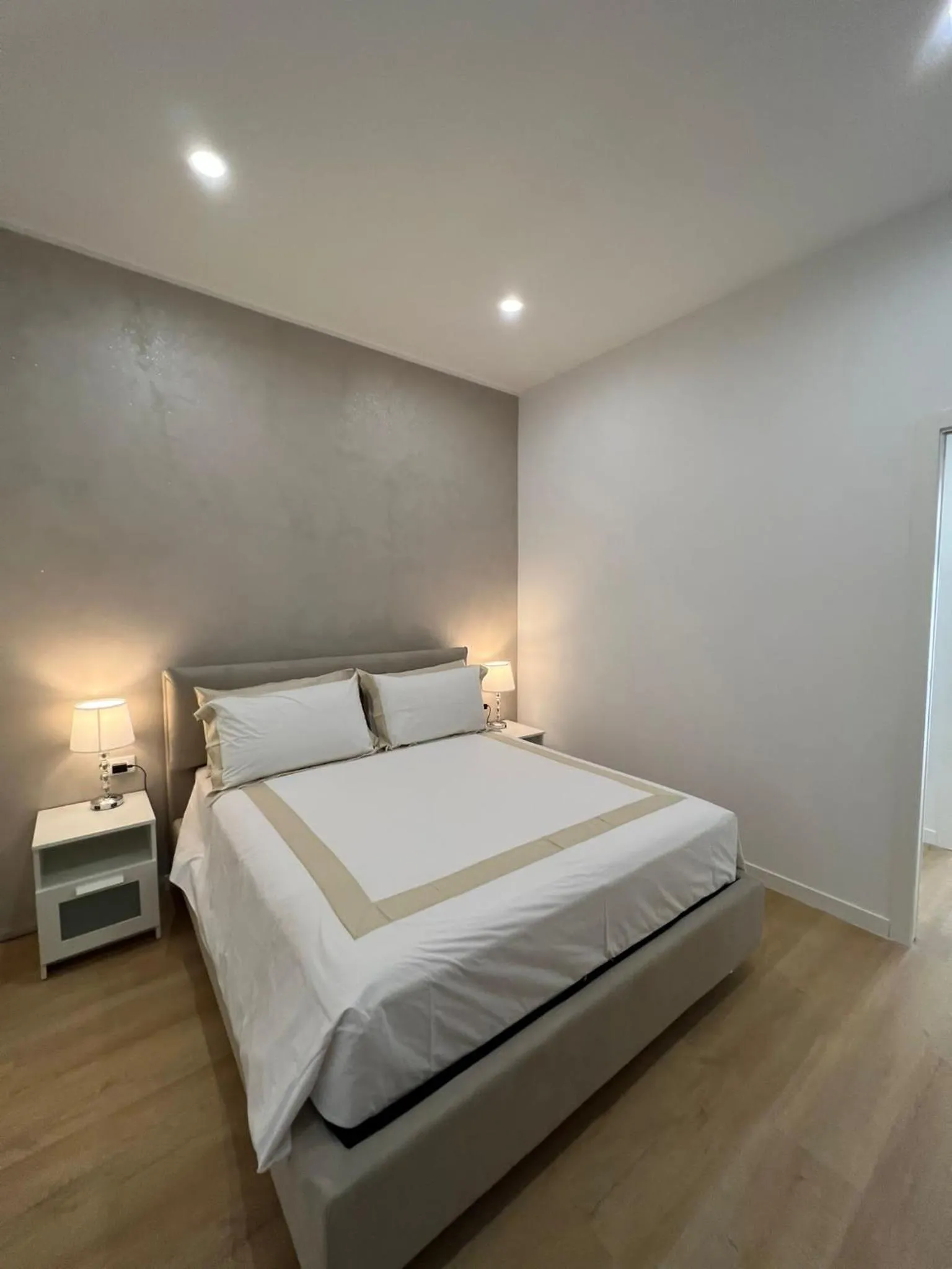 Bed in Blu Apartment