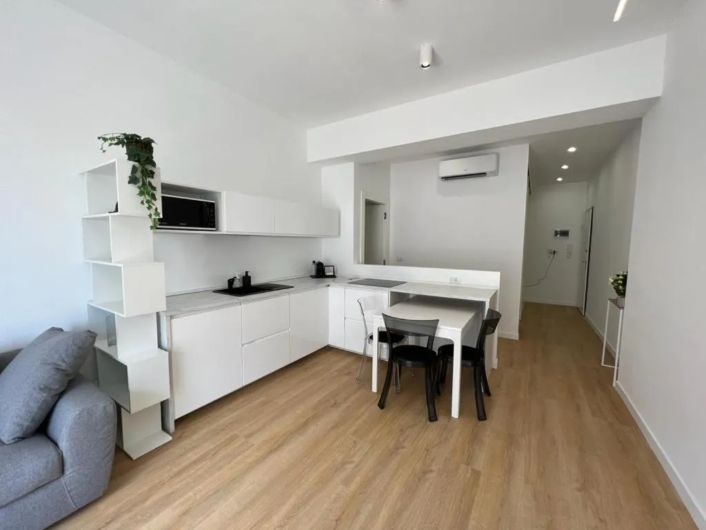 Kitchen or kitchenette in Blu Apartment