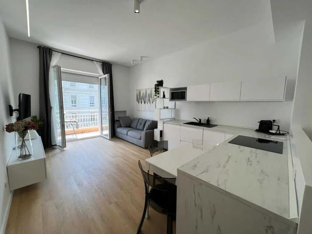 Kitchen or kitchenette in Blu Apartment